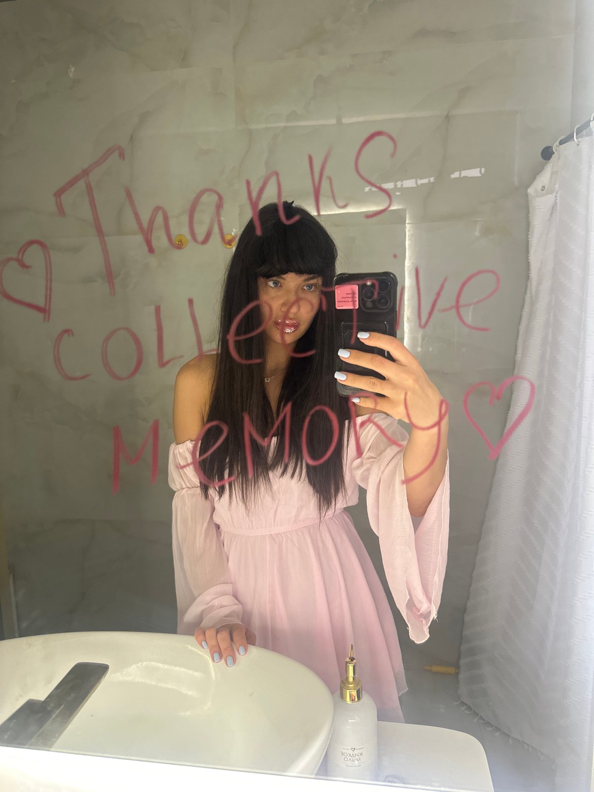 Woman takes bathroom mirror selfie in Khimki, Russia