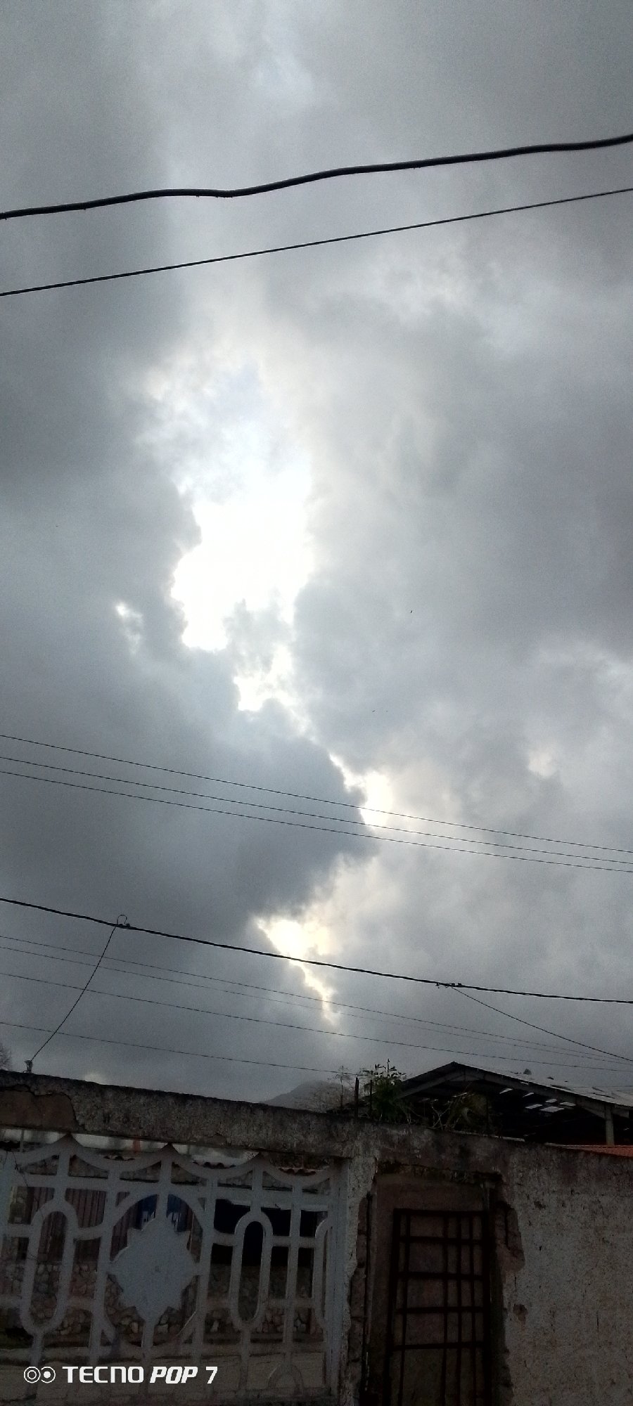 Dramatic overcast skies observed over Altagracia, Venezuela residential area