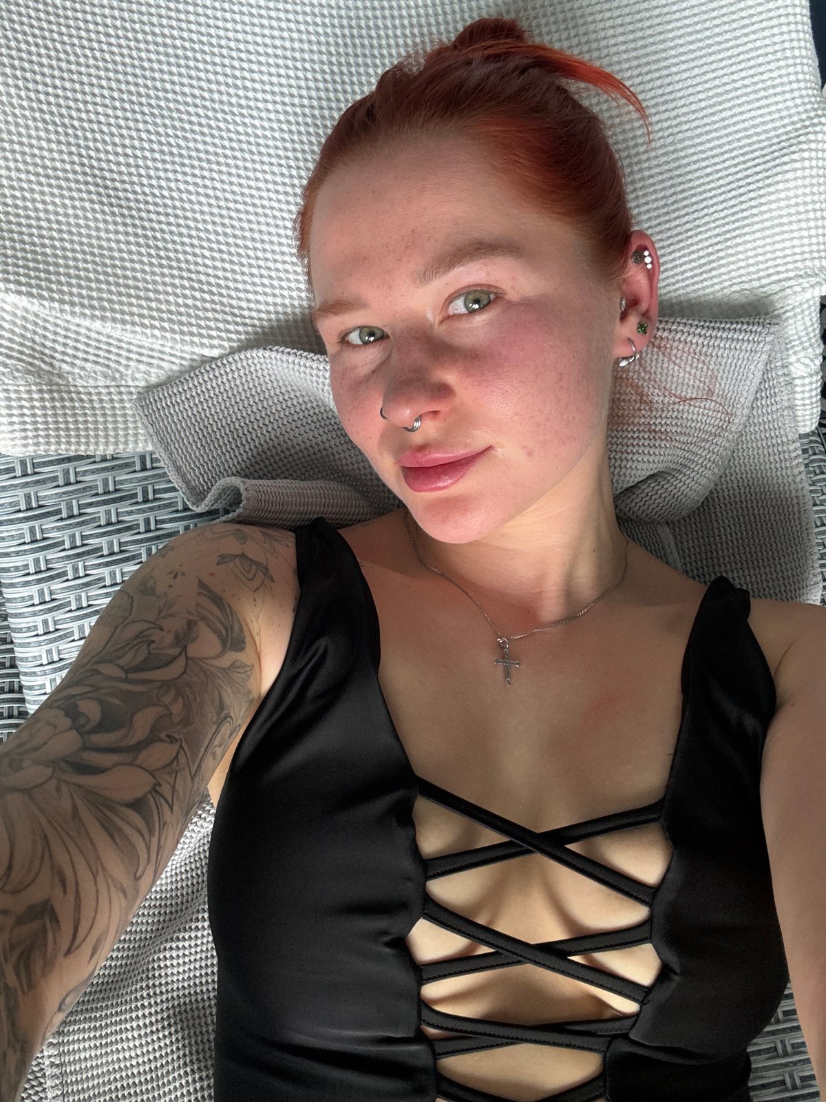 Woman observed resting on quilted surface in Rostov-on-Don