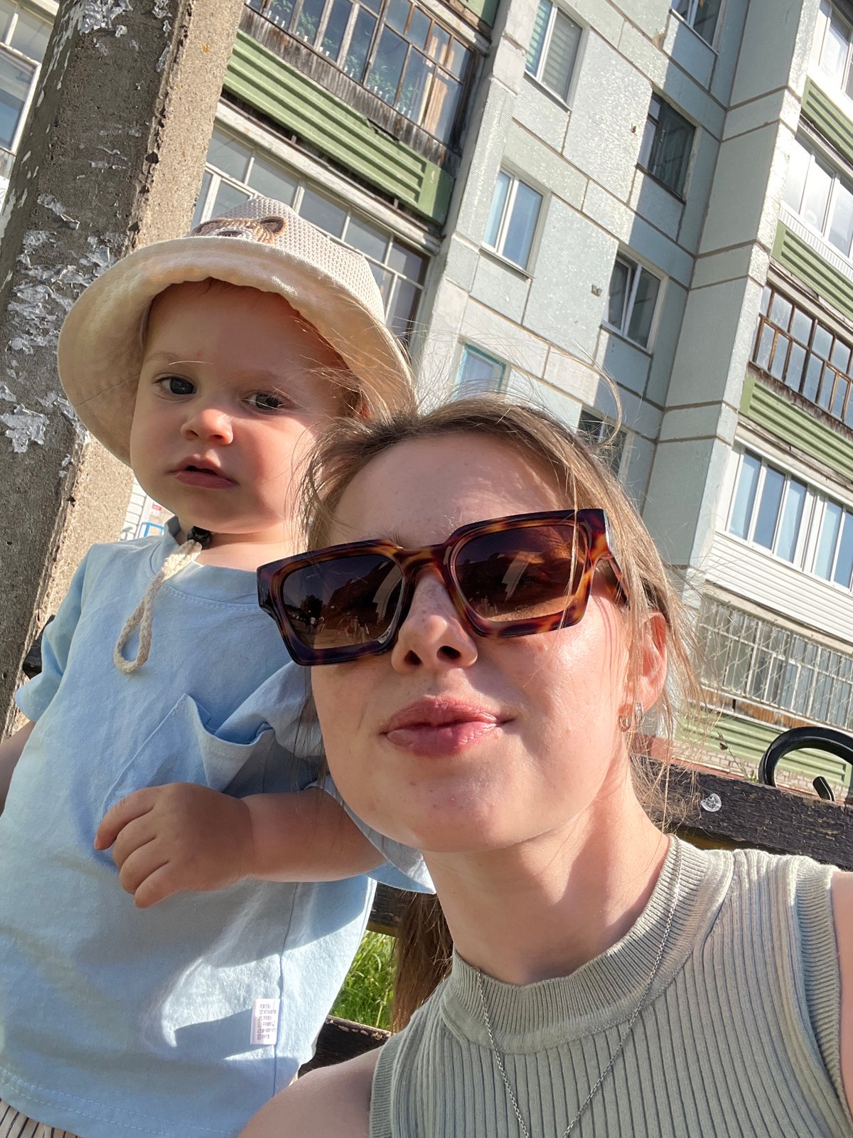 Mother and child enjoy sunny afternoon in Chaikovsky park
