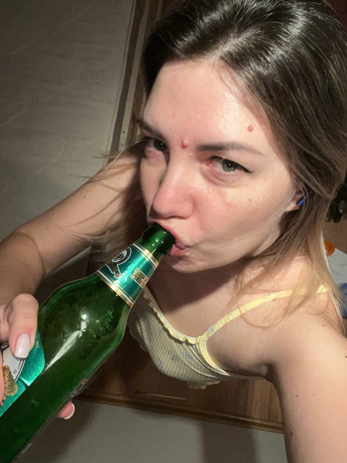 Casual selfie session with a green bottle in Sochi
