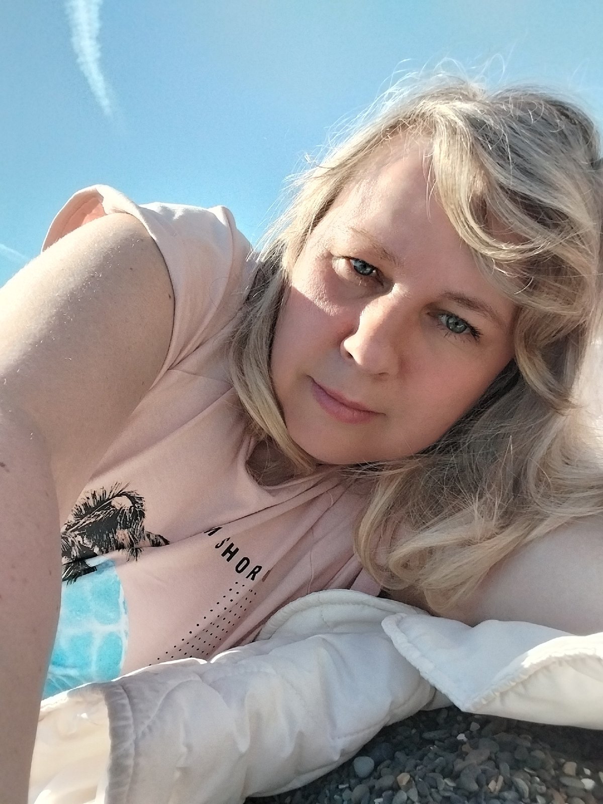 Outdoor portraits and waterfront promenade documented during midday hours
