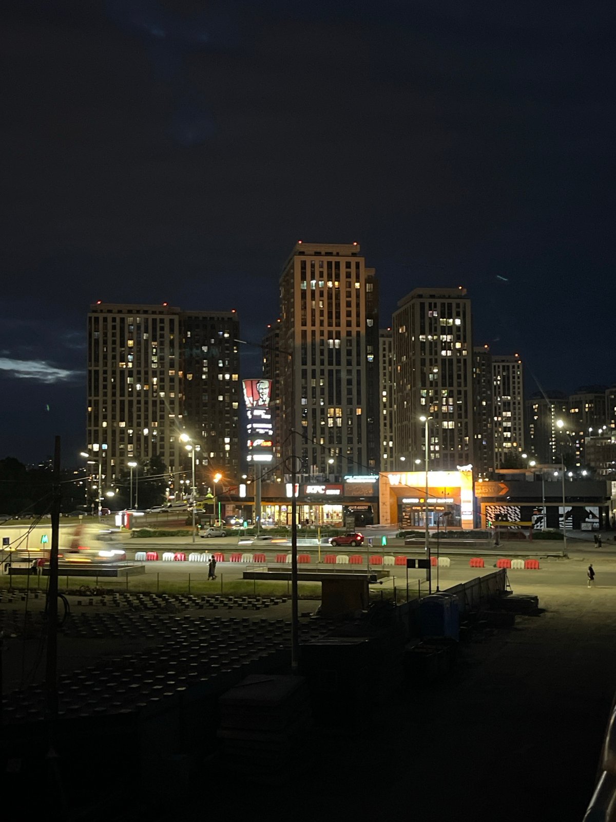Evening lights illuminate Kyiv residential towers