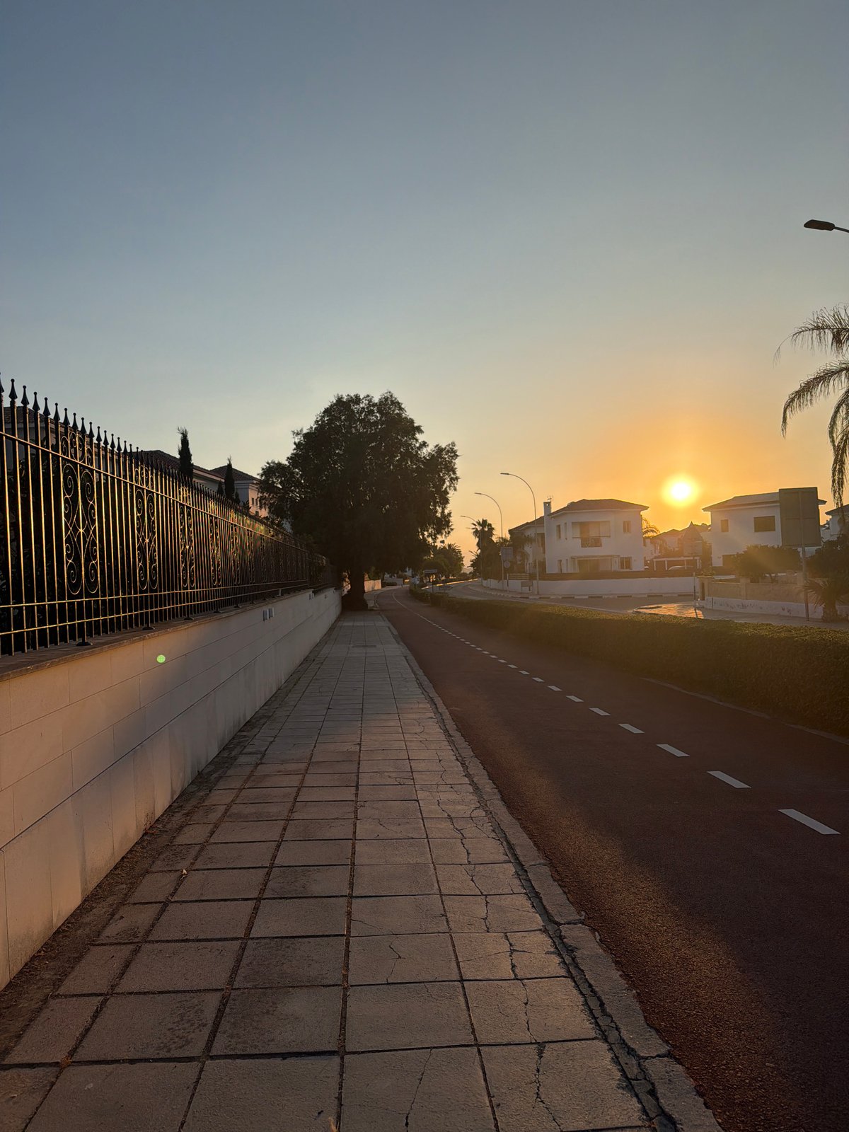 Evening stroll through Pervolia residential area during golden hour