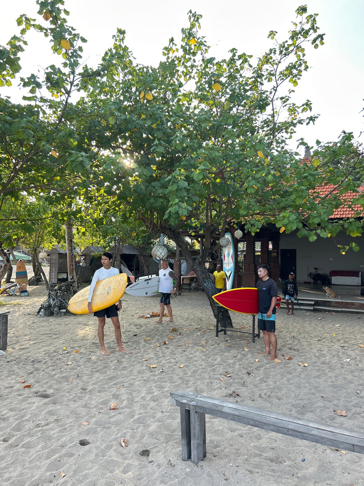 Kuta Beach: surfboards, fishing boats, and a sunny afternoon