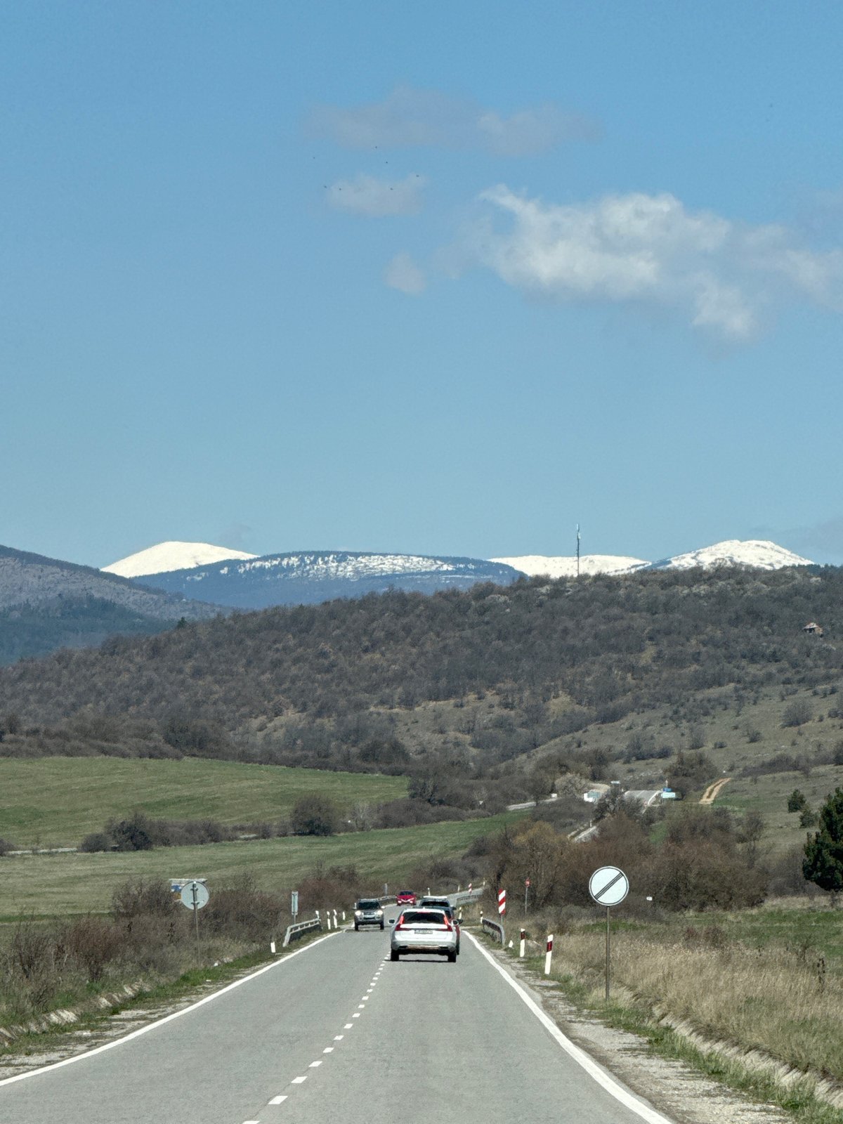 Road scene documented in Drenovo, Bulgaria with mountain backdrop