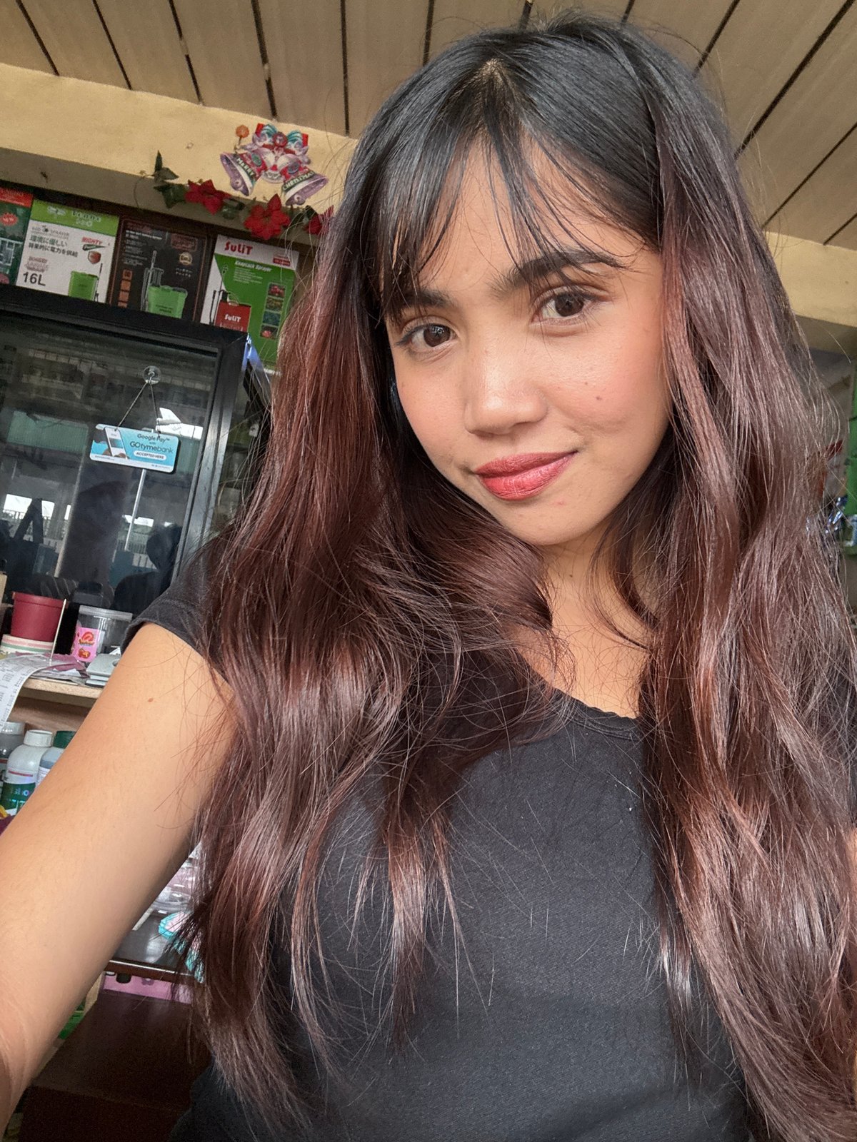 Woman documents evening outing with selfies across Tagum City