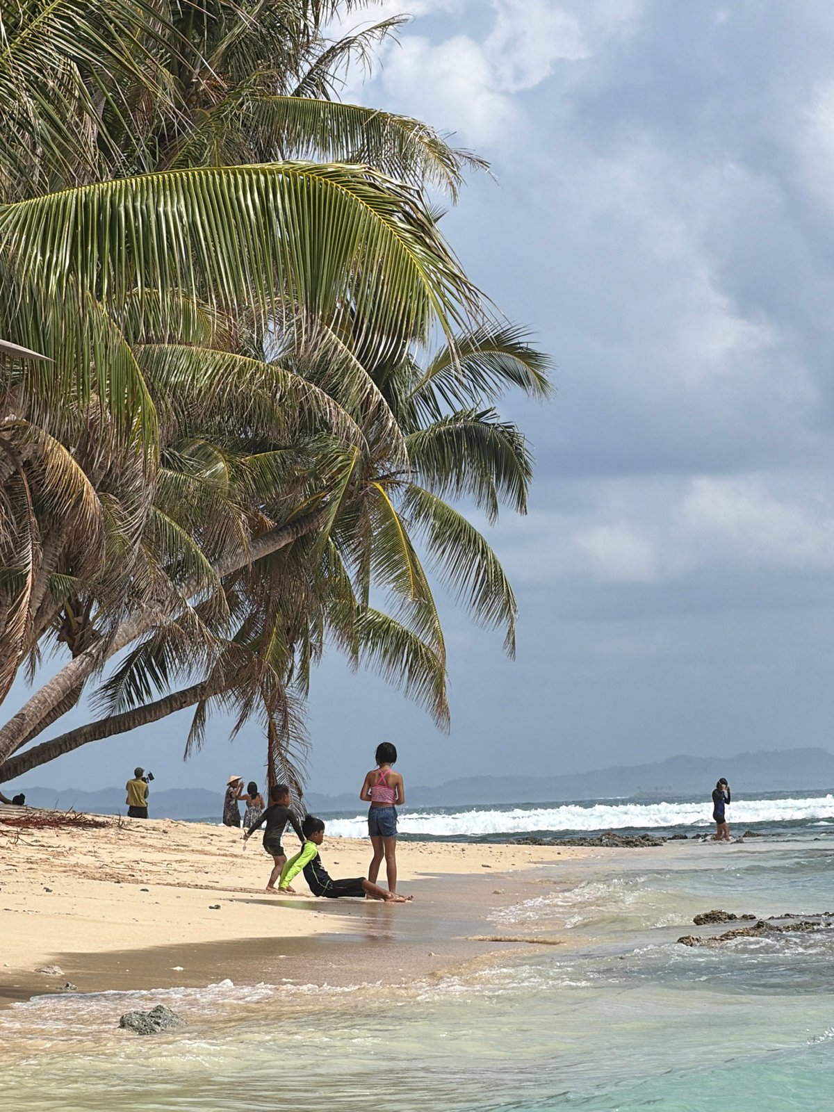 Tropical beach scene documented in General Luna, Philippines