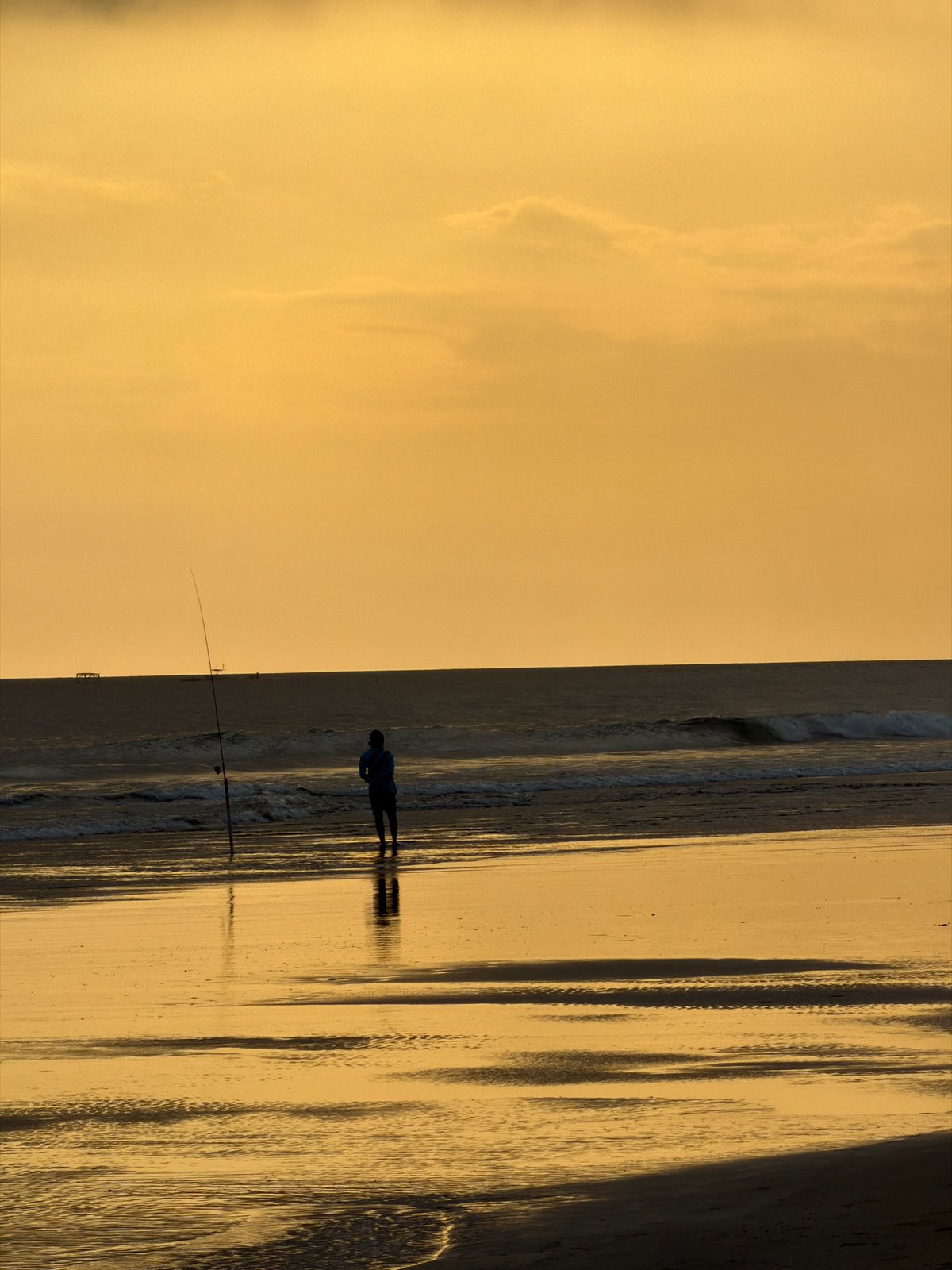 Sunset silhouettes on Kuta Beach, Bali