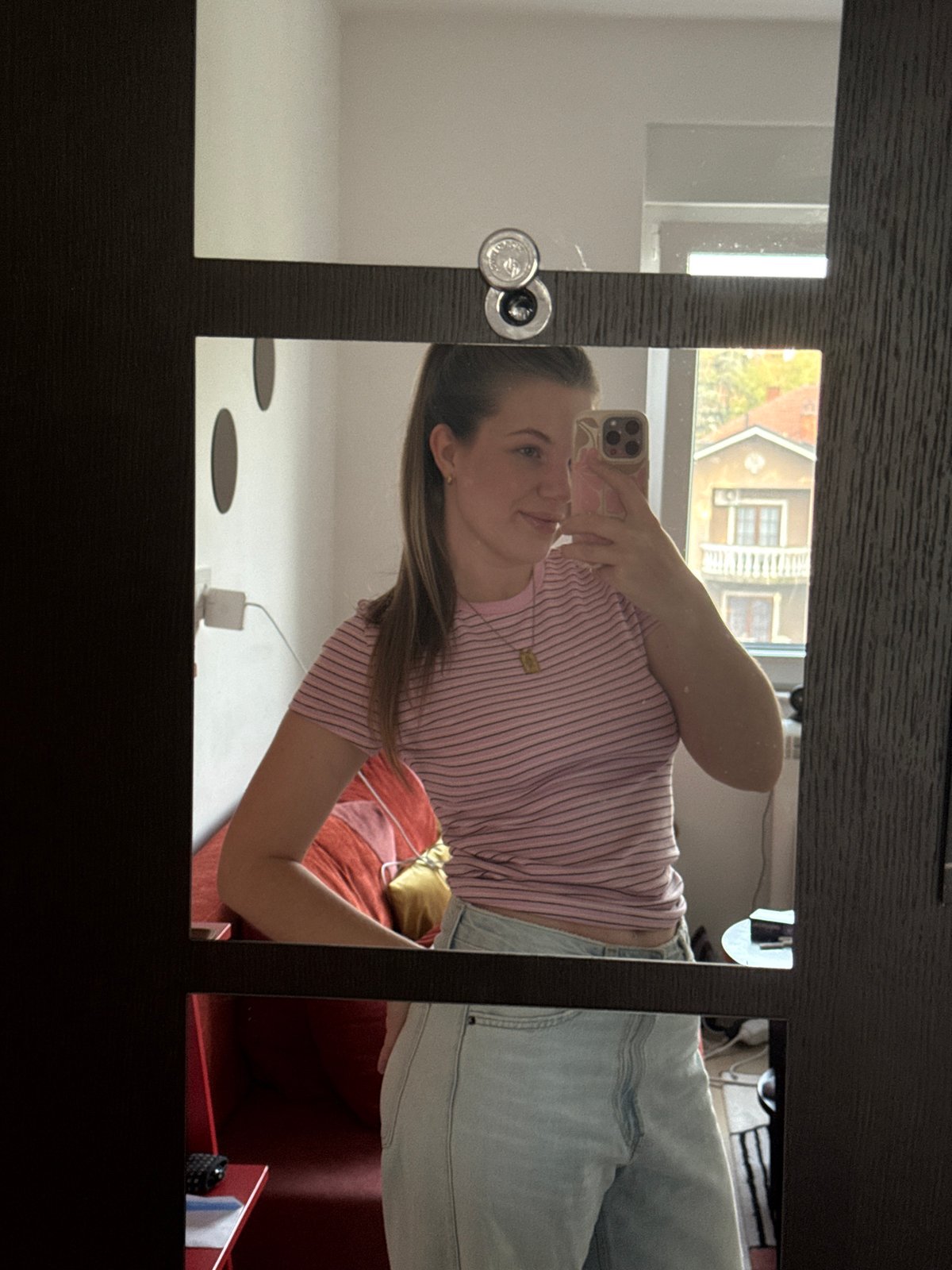 Woman takes mirror selfie in Belgrade suburb Friday morning