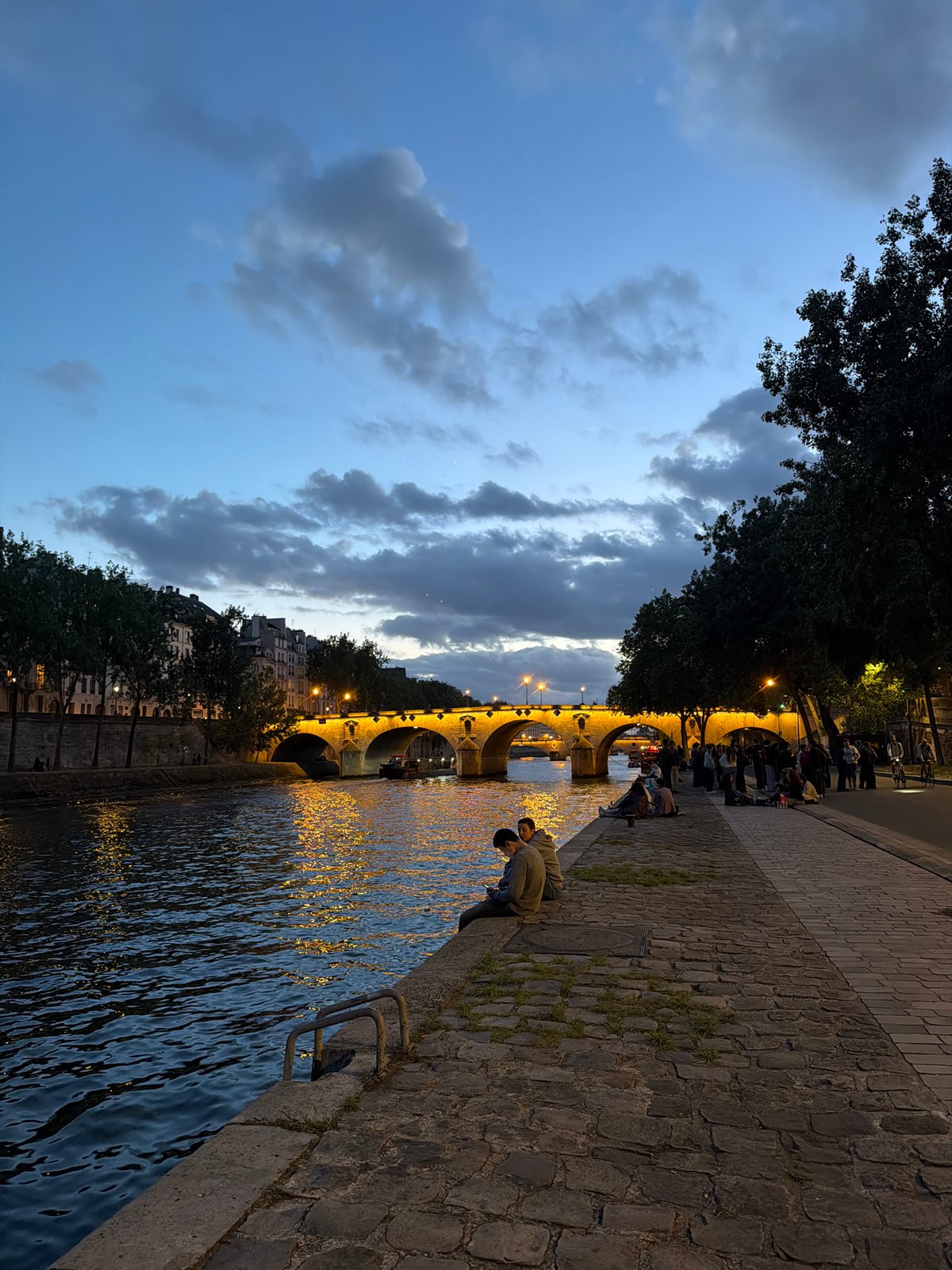 Evening twilight observed along Seine River near Pont Neuf bridge