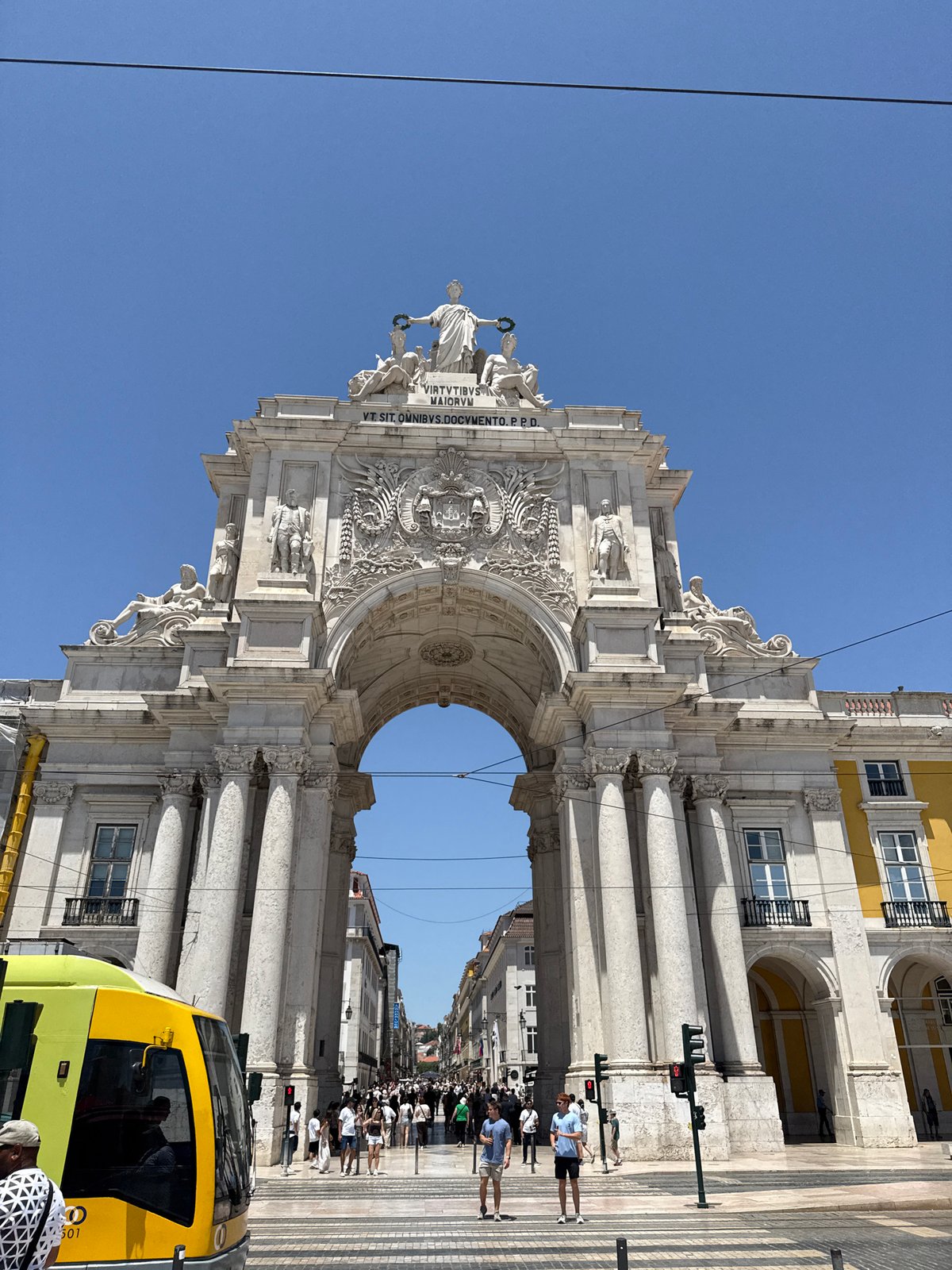 Lisbon's Praça do Comércio buzzes on a sunny afternoon
