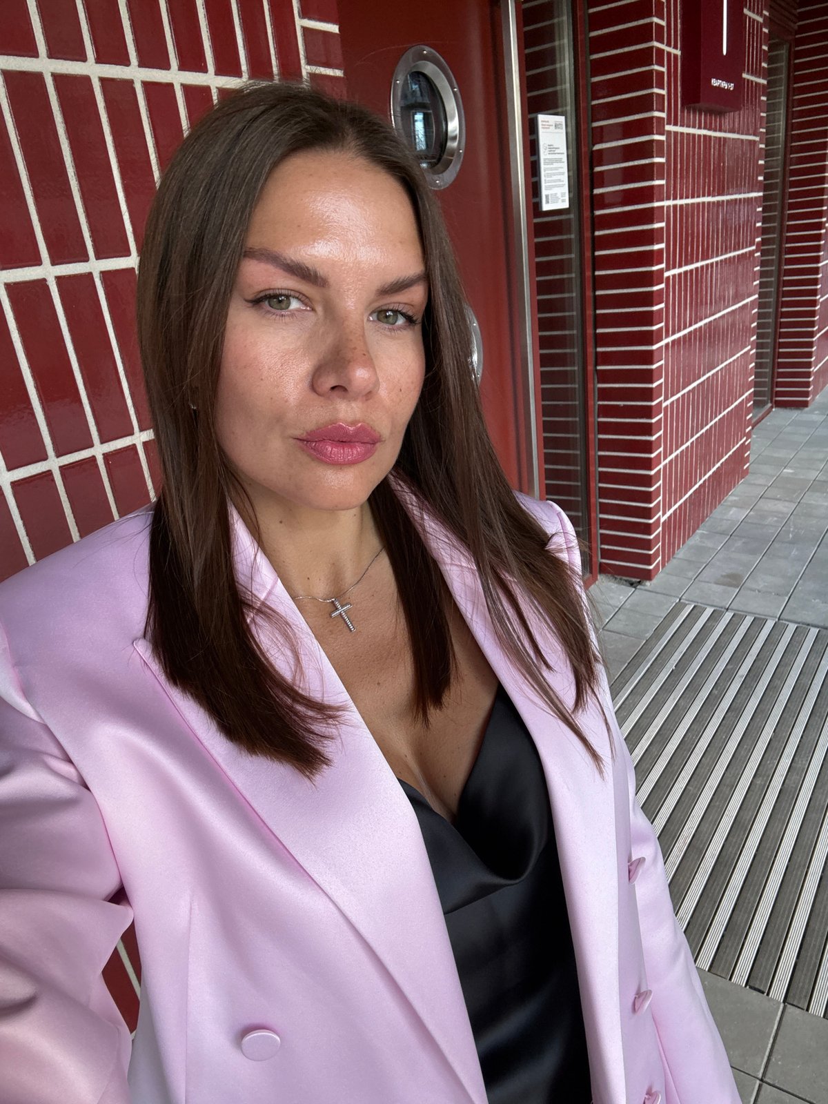 Styled selfie in Tyumen, satin layers and a silver cross