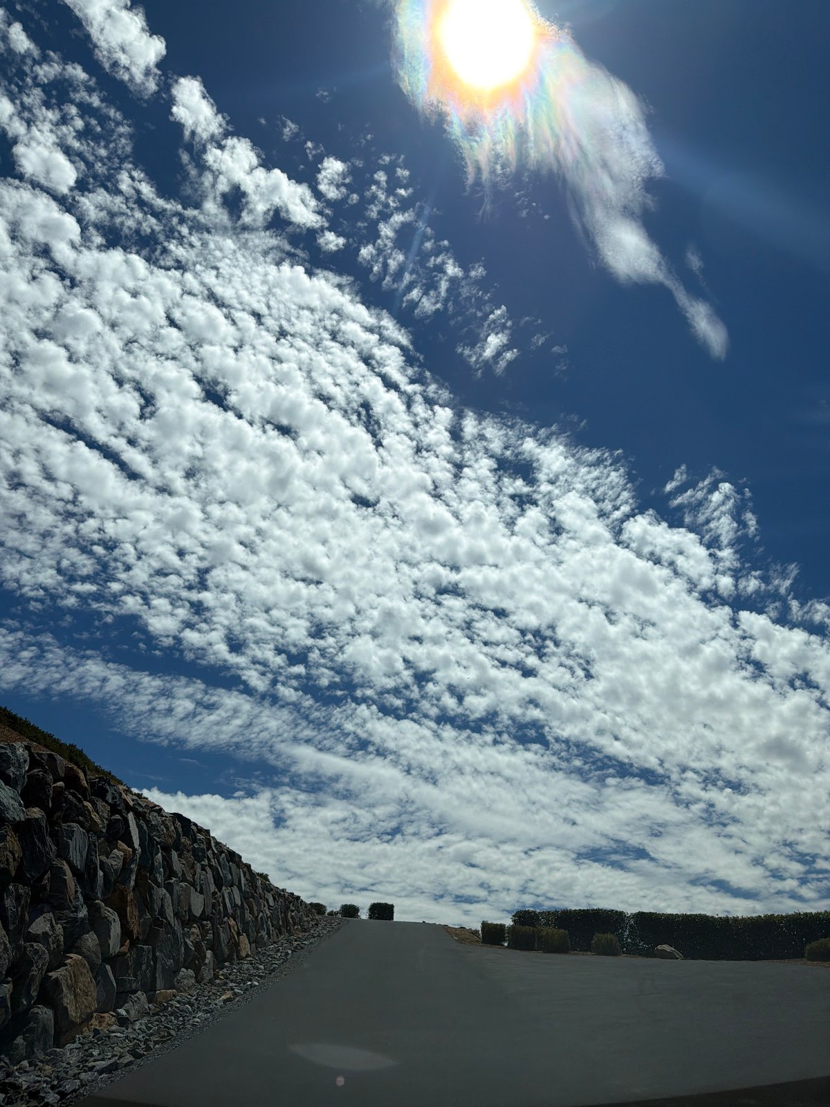 Iridescent cloud catches sunlight over El Dorado Hills
