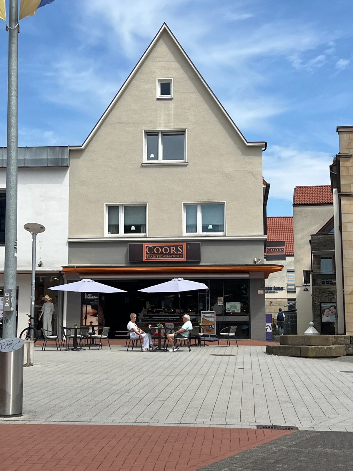 Exploring a German-style pedestrian town center on a summer morning