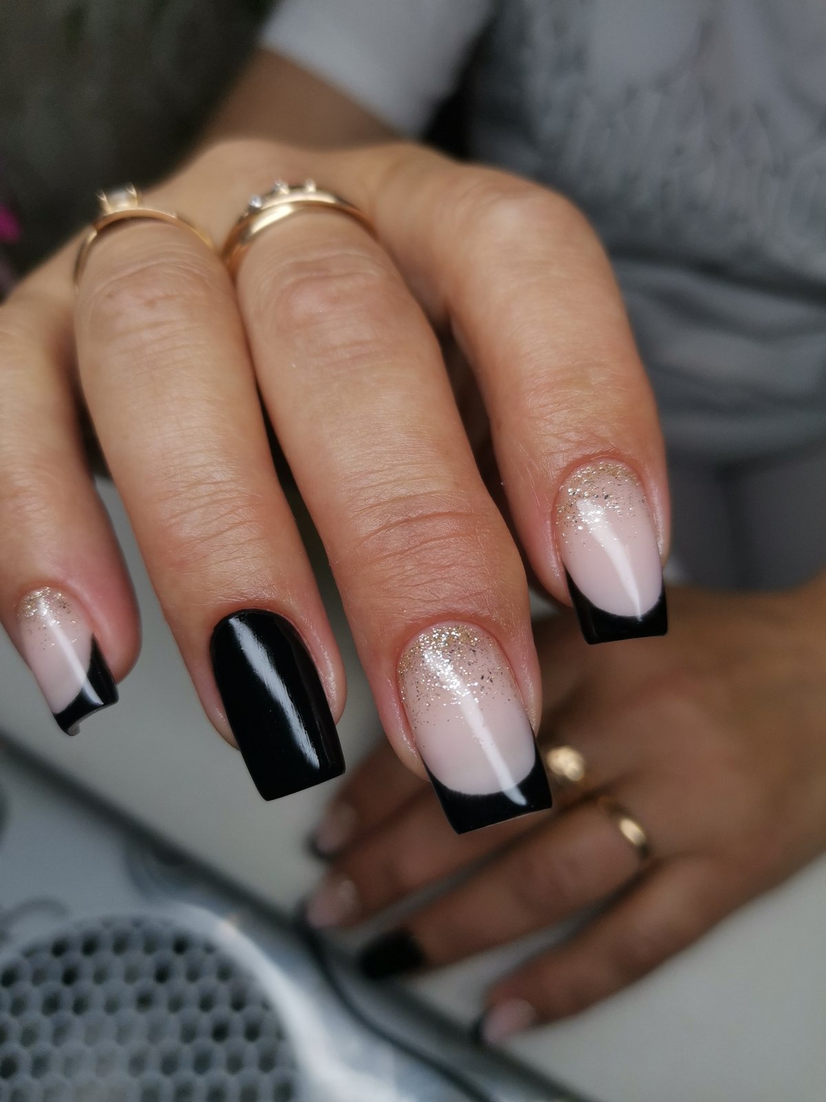 Black-tip French manicure detail, Kizel