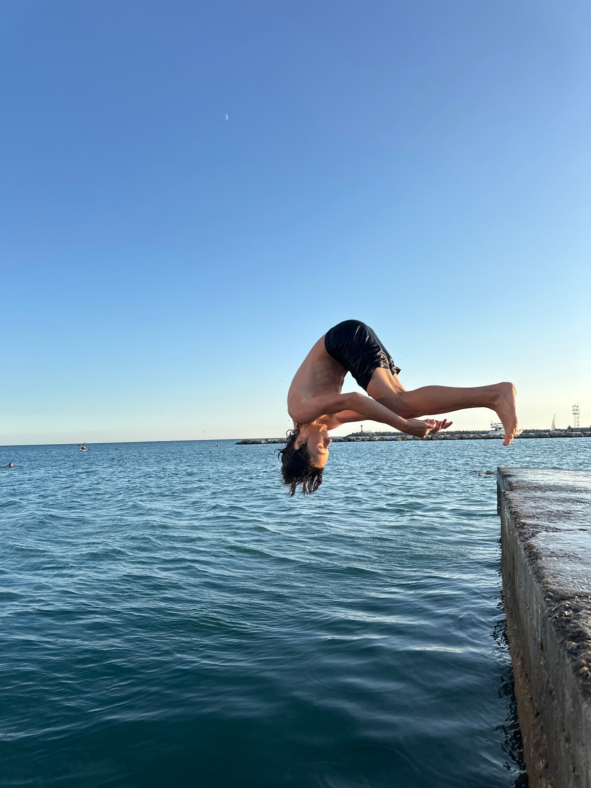 Sochi waterfront at golden hour: dives, sunsets, and city architecture