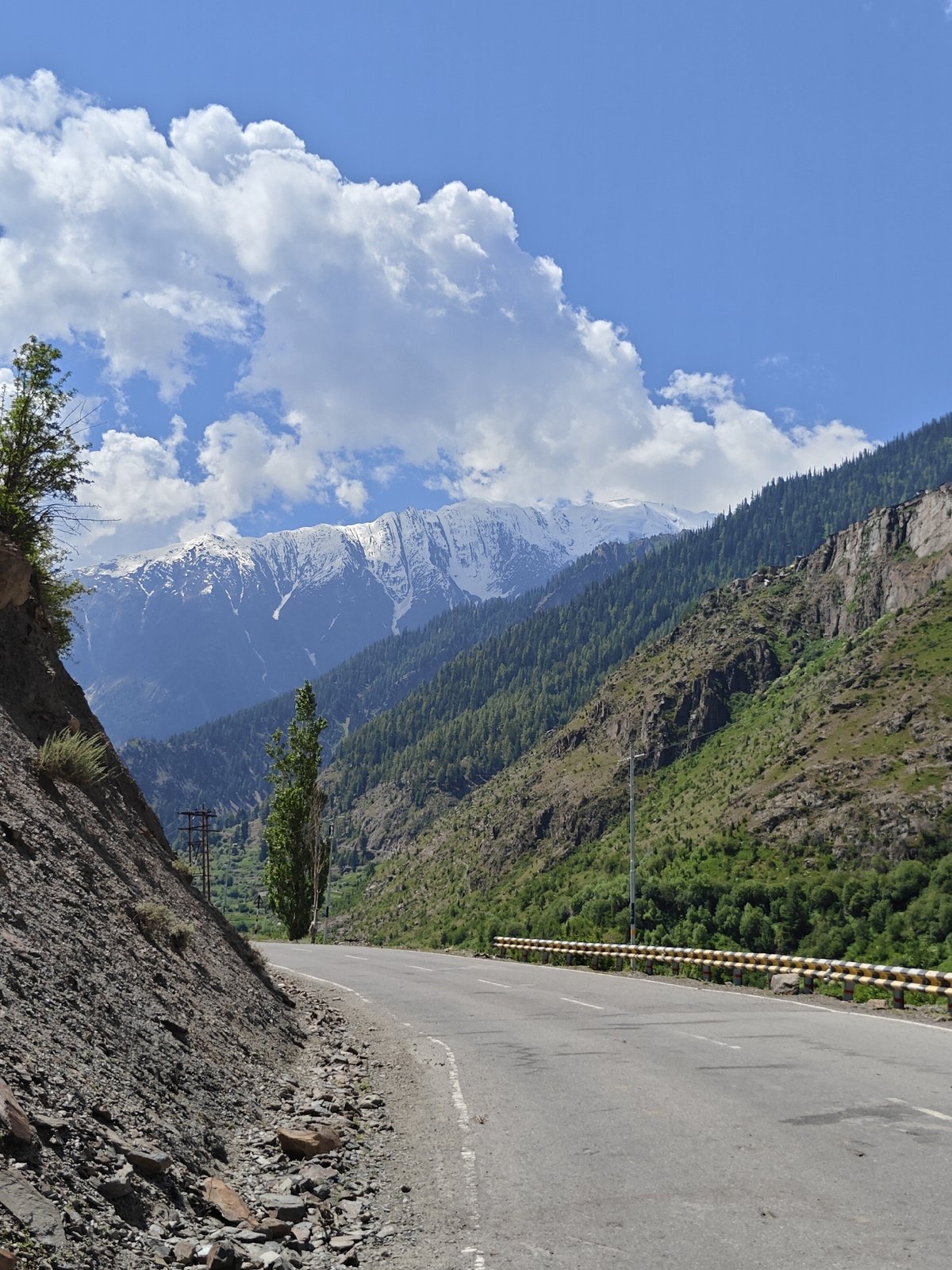 Remote Himalayan village, mountain roads, and a damaged bridge in Kishorl
