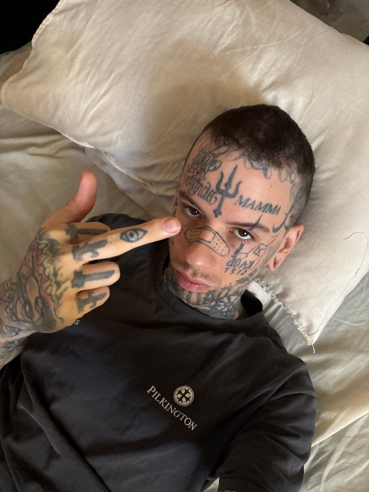 Tattooed man photographed drinking mate in Buenos Aires portraits
