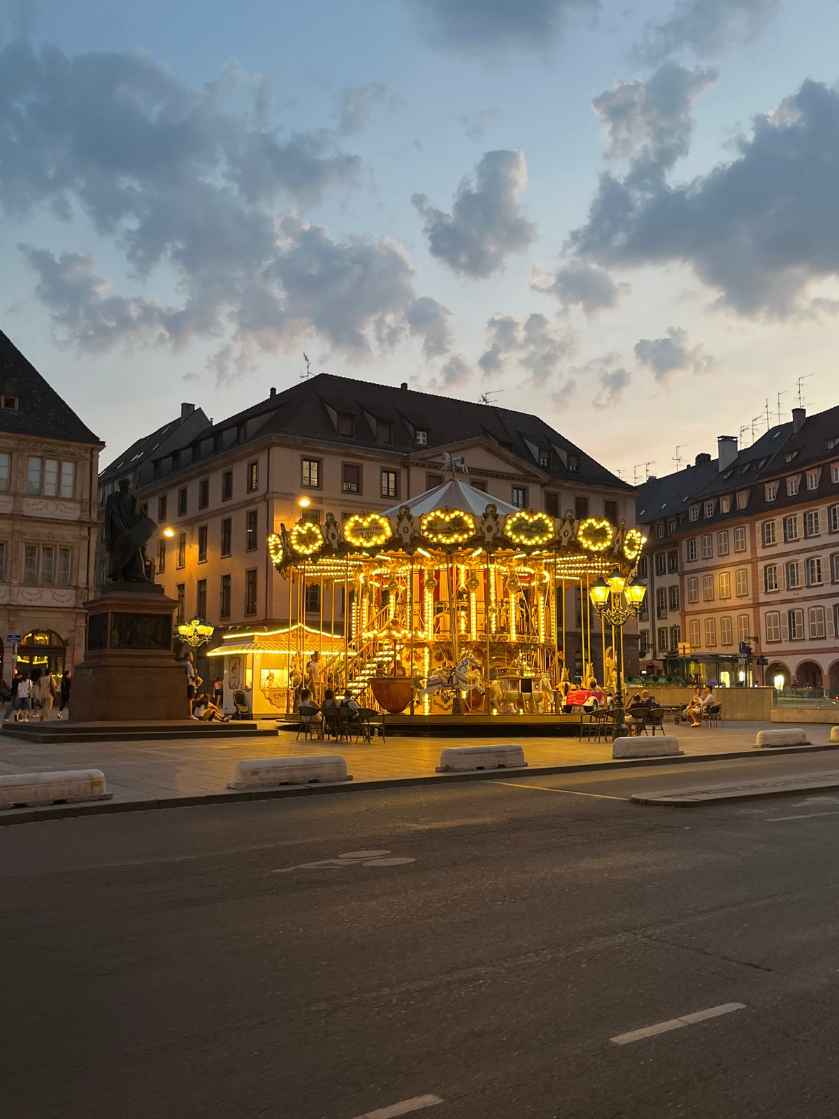 Carousel lights up Place Kléber on a Strasbourg summer evening