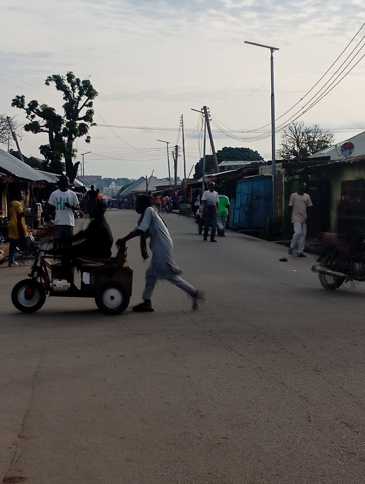 Everyday street traffic and commerce in Shendam, Nigeria
