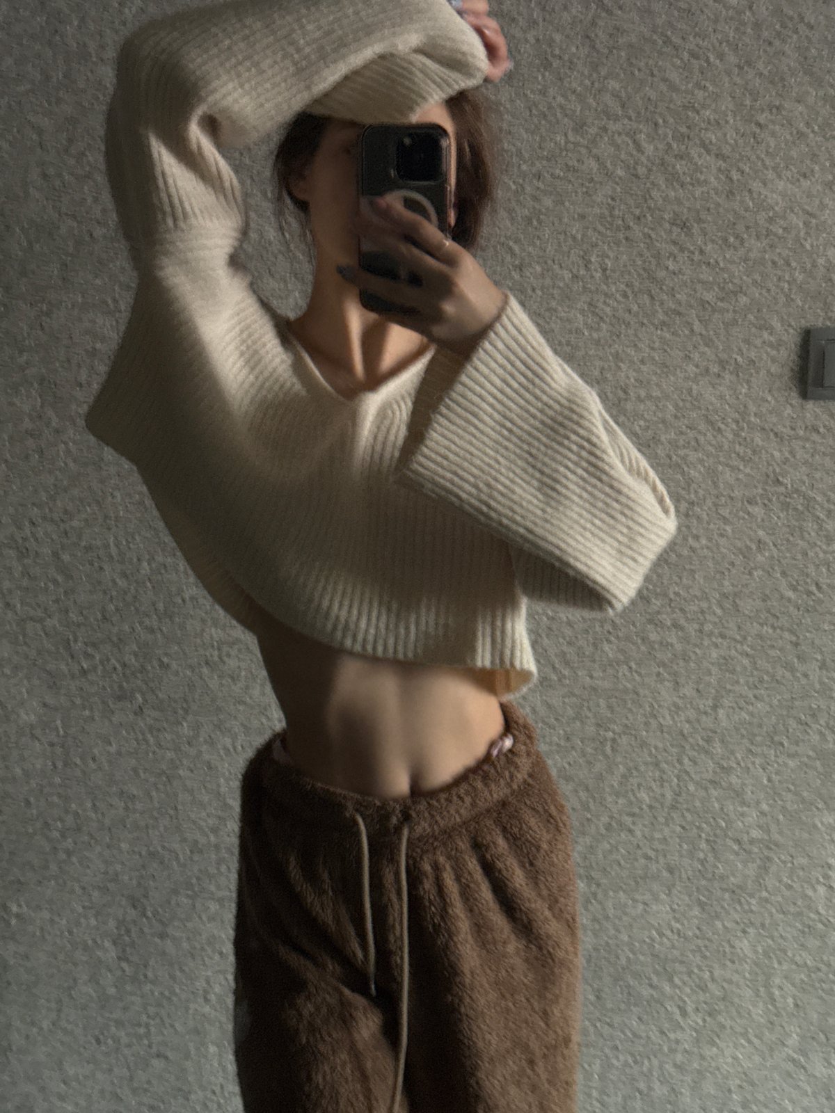 Woman takes morning selfie in Sofia mirror