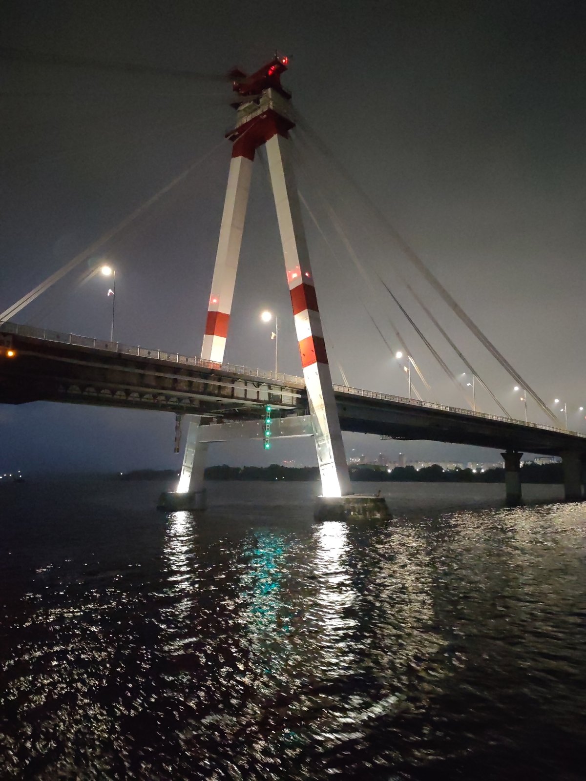 October Bridge illuminated at night in Cherepovets, Russia