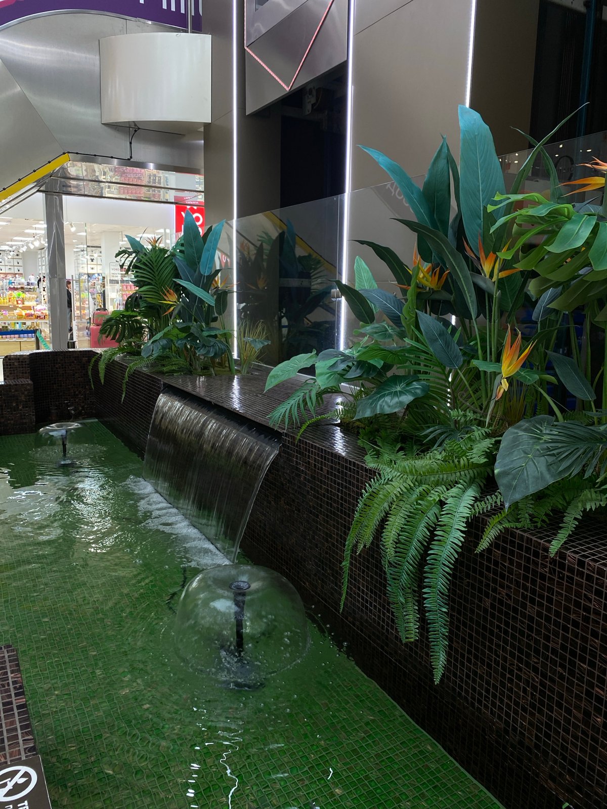 Indoor commercial facility documented in Sochi with water features