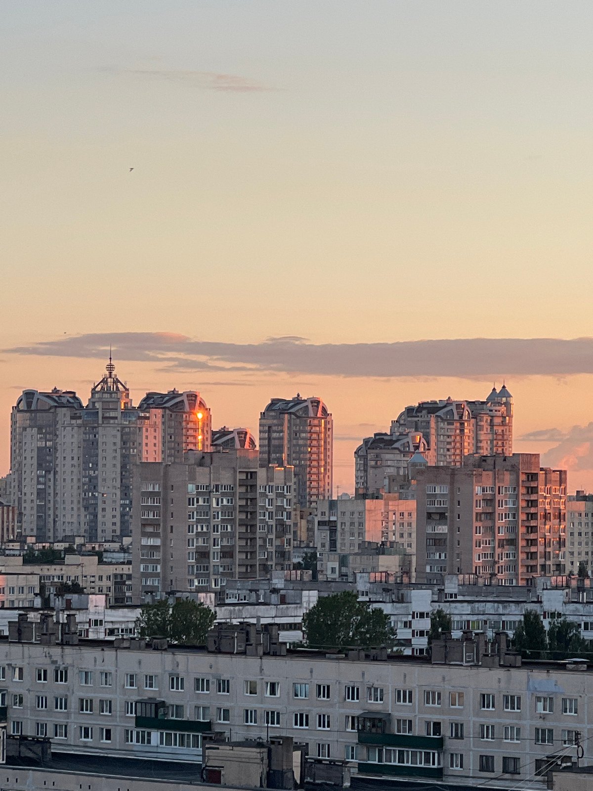 Partial solar eclipse at sunset over Lednevo, Russia