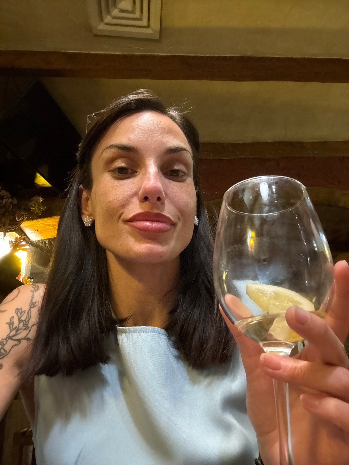 Woman documents evening drinks and selfies in Pleven restaurant