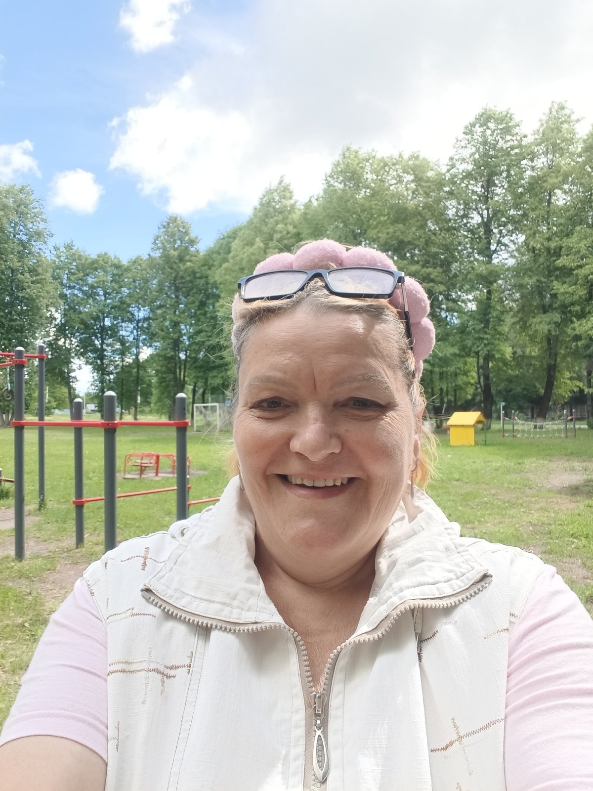 Woman documents park visit in Красный Маяк, Russia