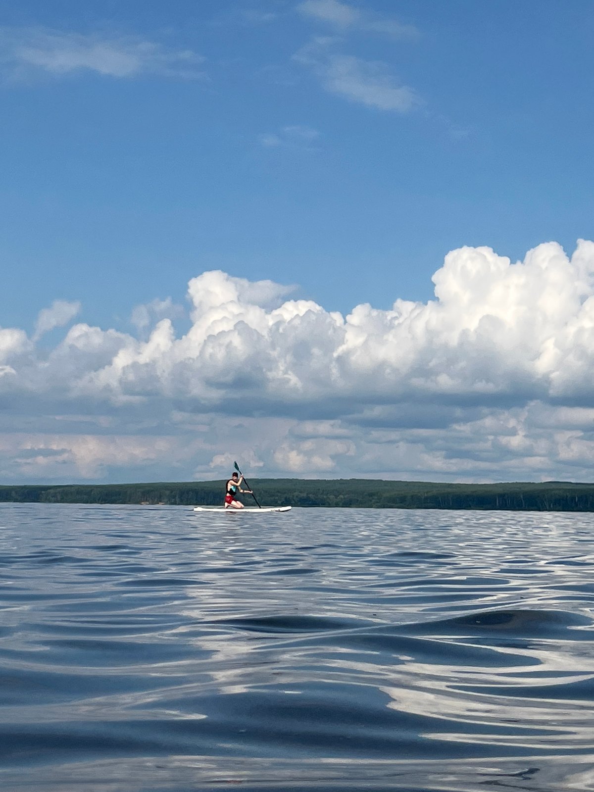 Summer morning on the Kama River: paddleboards, swimmers, and shoreside scenes