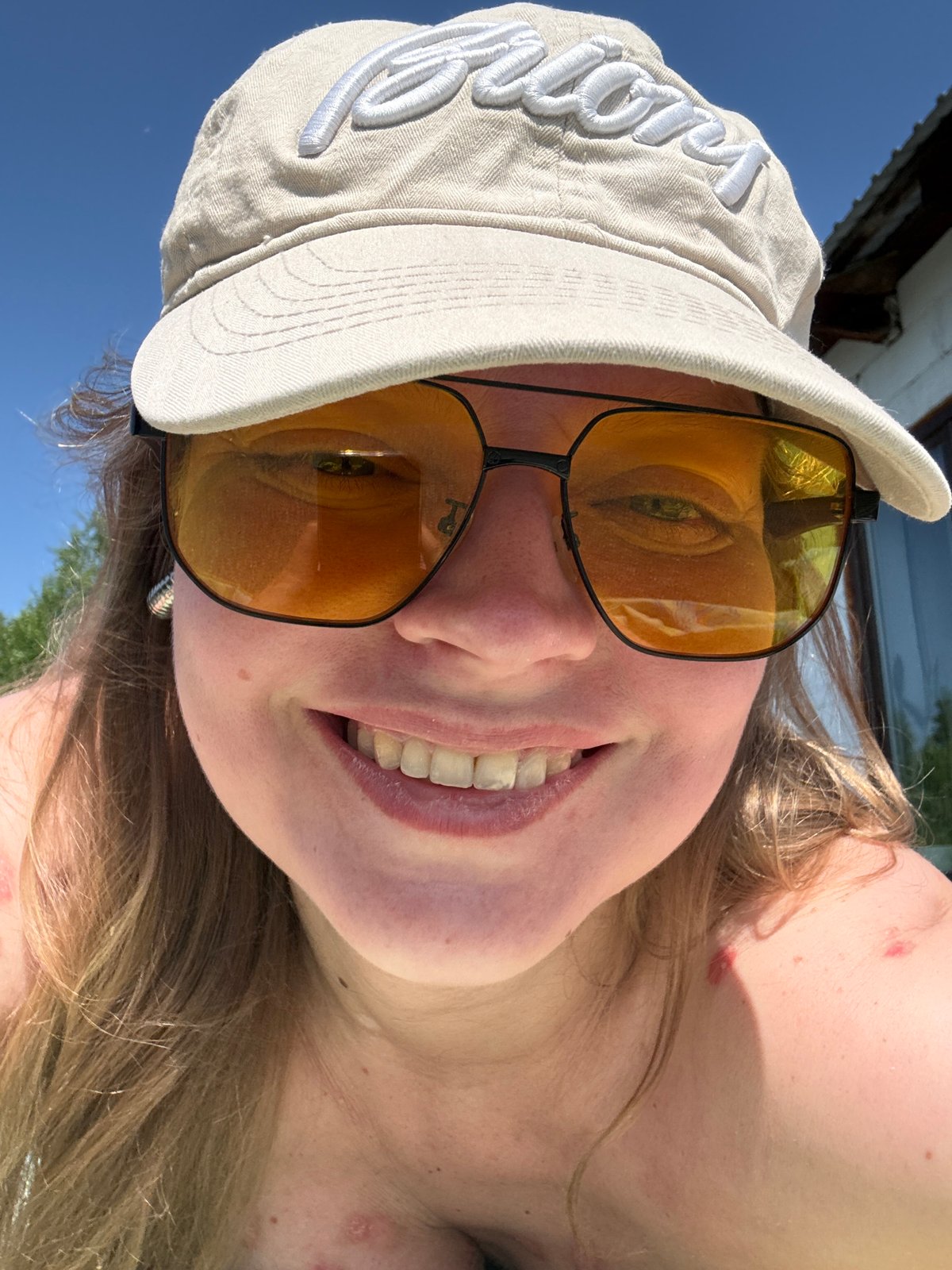 Woman Takes Morning Selfies Under Blue Skies in Izhevsk