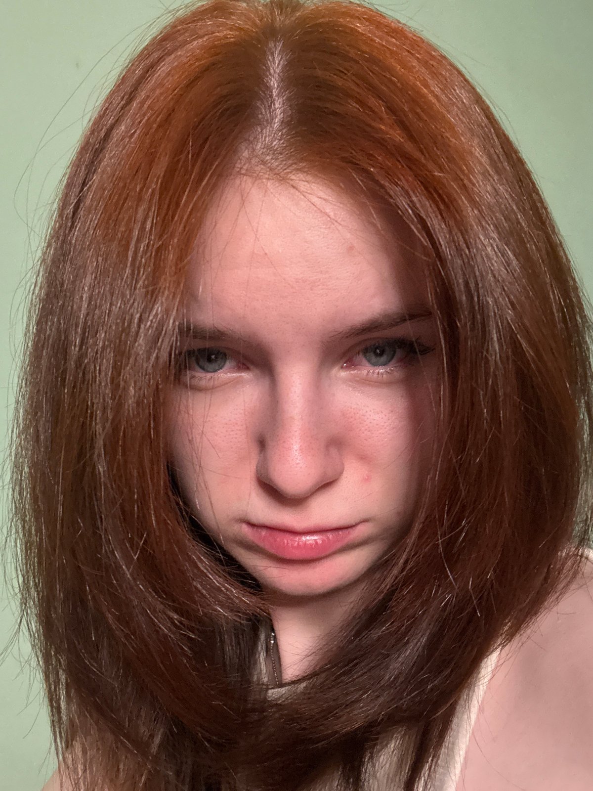 Red-haired woman photographed in bedroom setting over six minutes