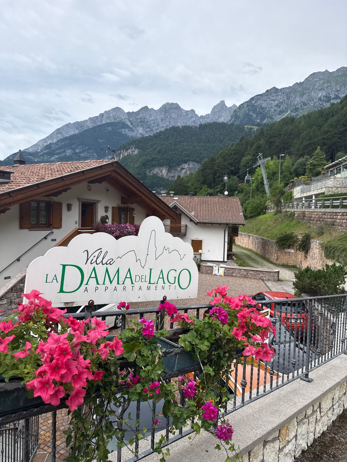 Morning around Molveno's lake, trails, and mountain cable cars
