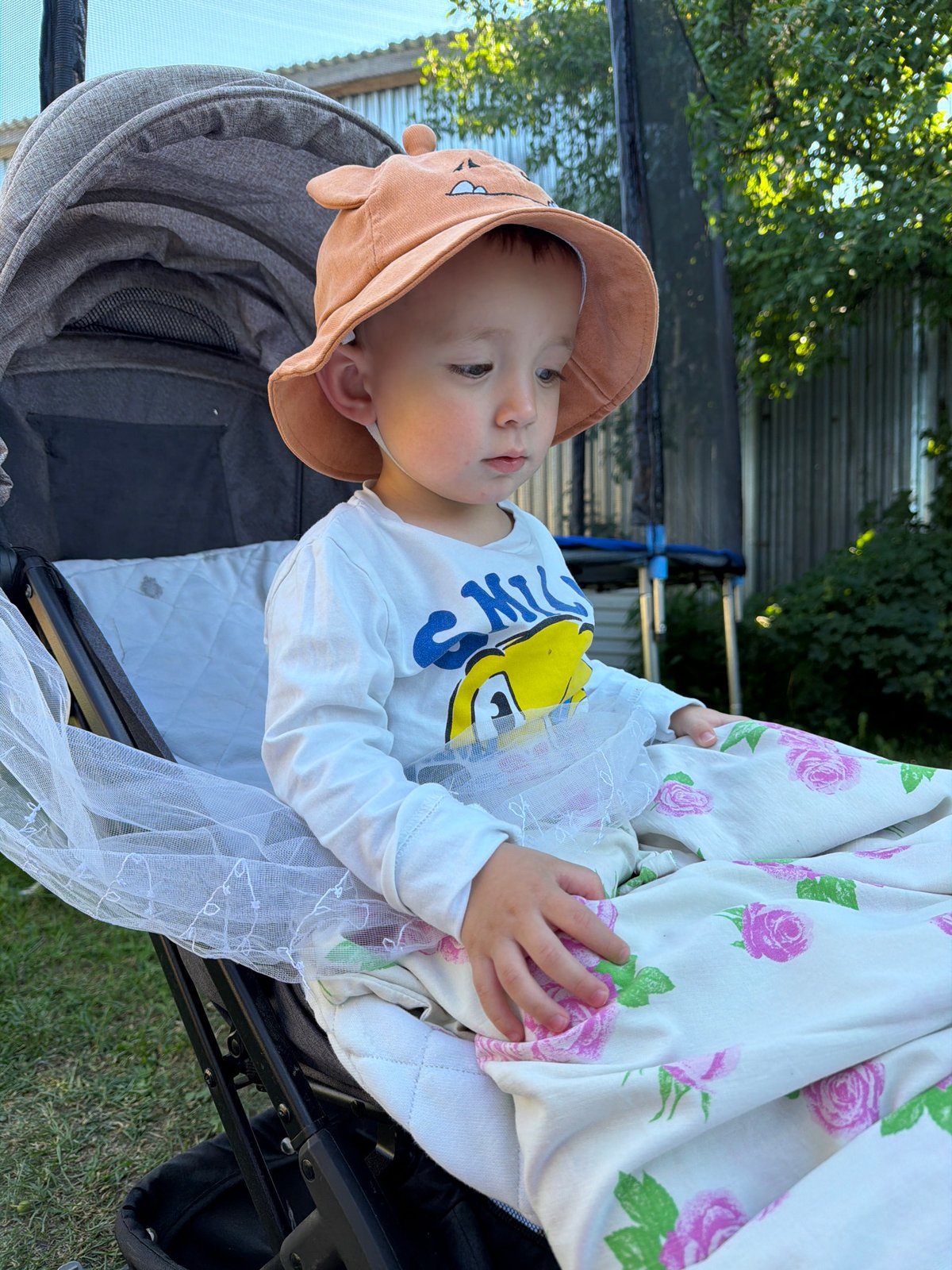 Family enjoys afternoon backyard activities in Russian village