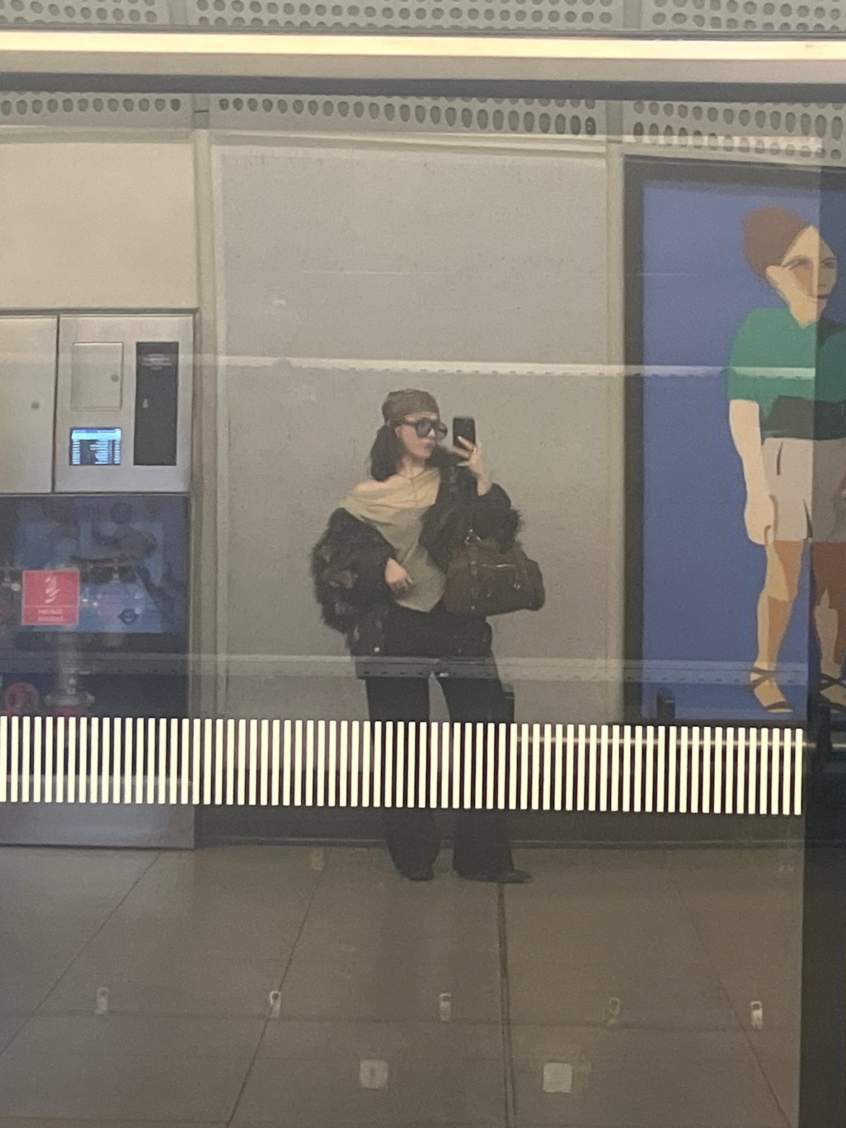 Glass panel reflections create layered visual effect in London