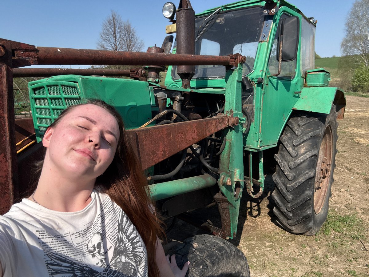 Rural life moments documented in Lukintsy, Russia during spring morning