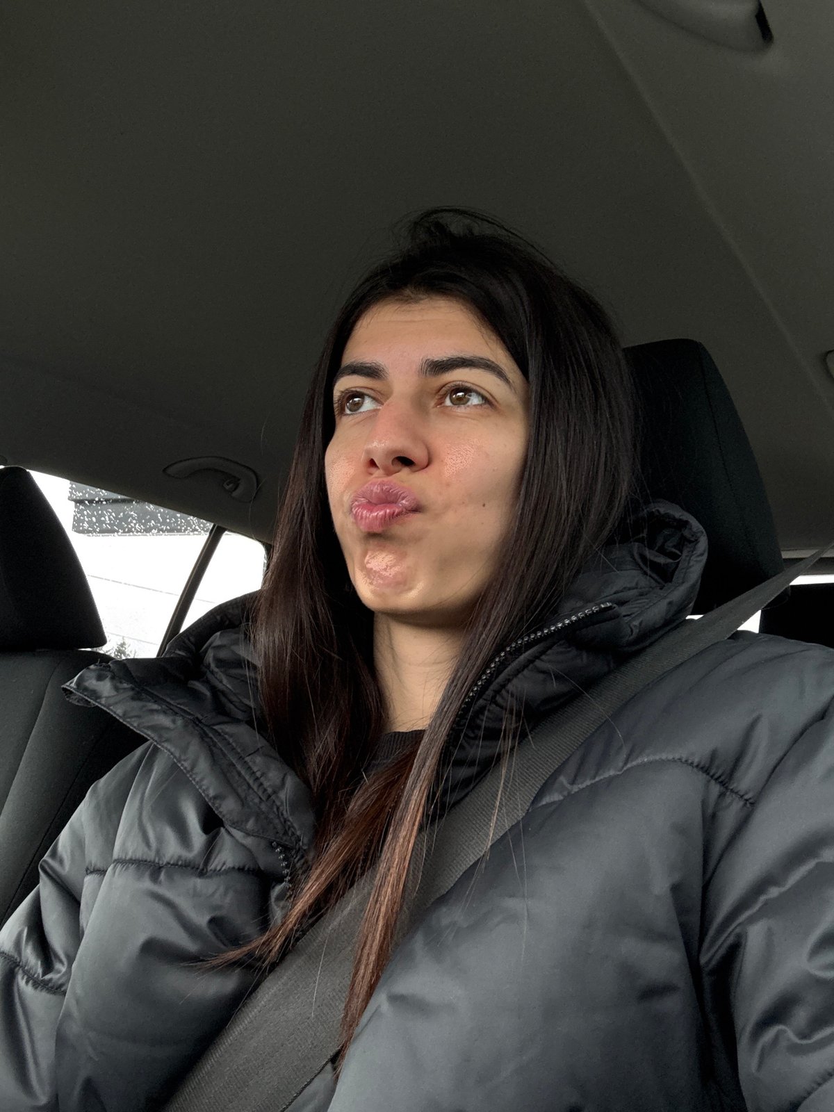Woman takes selfie in car in Sofia
