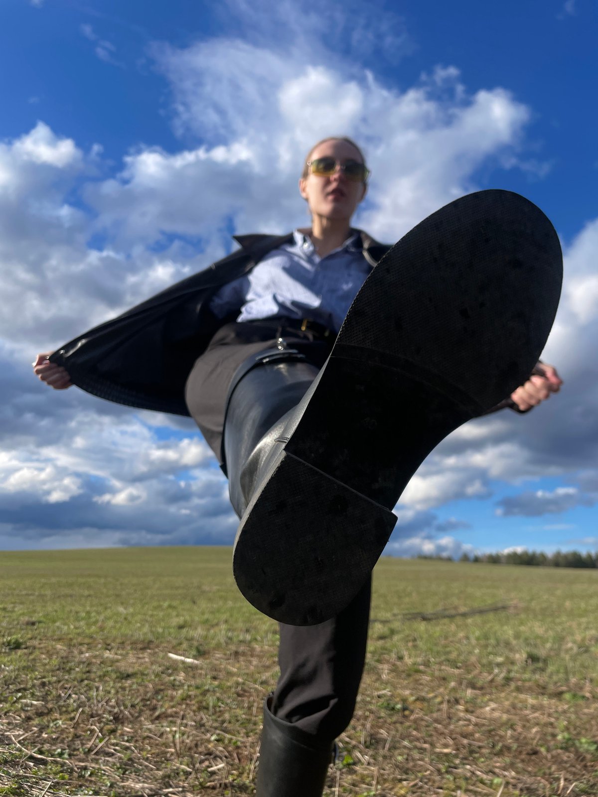 Man photographed in rural Russian fields near Udmurt settlements