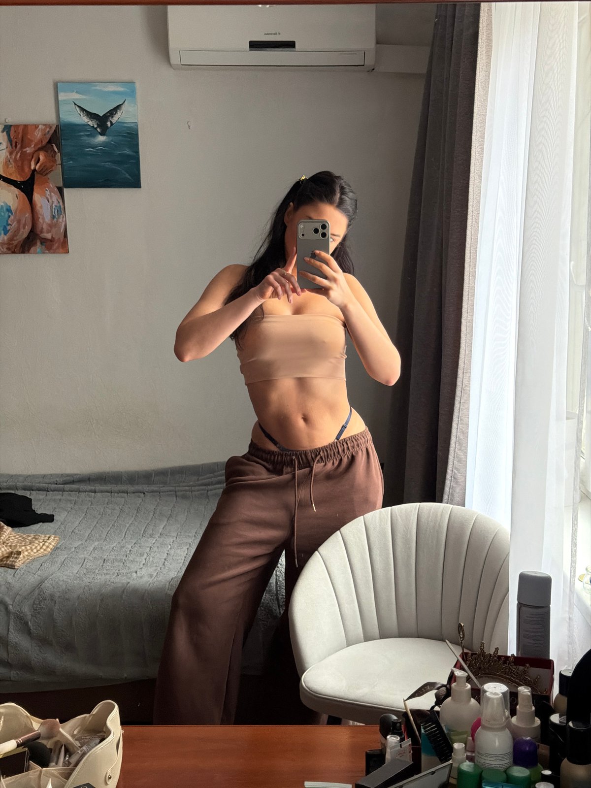 Woman takes morning selfie in Moscow apartment