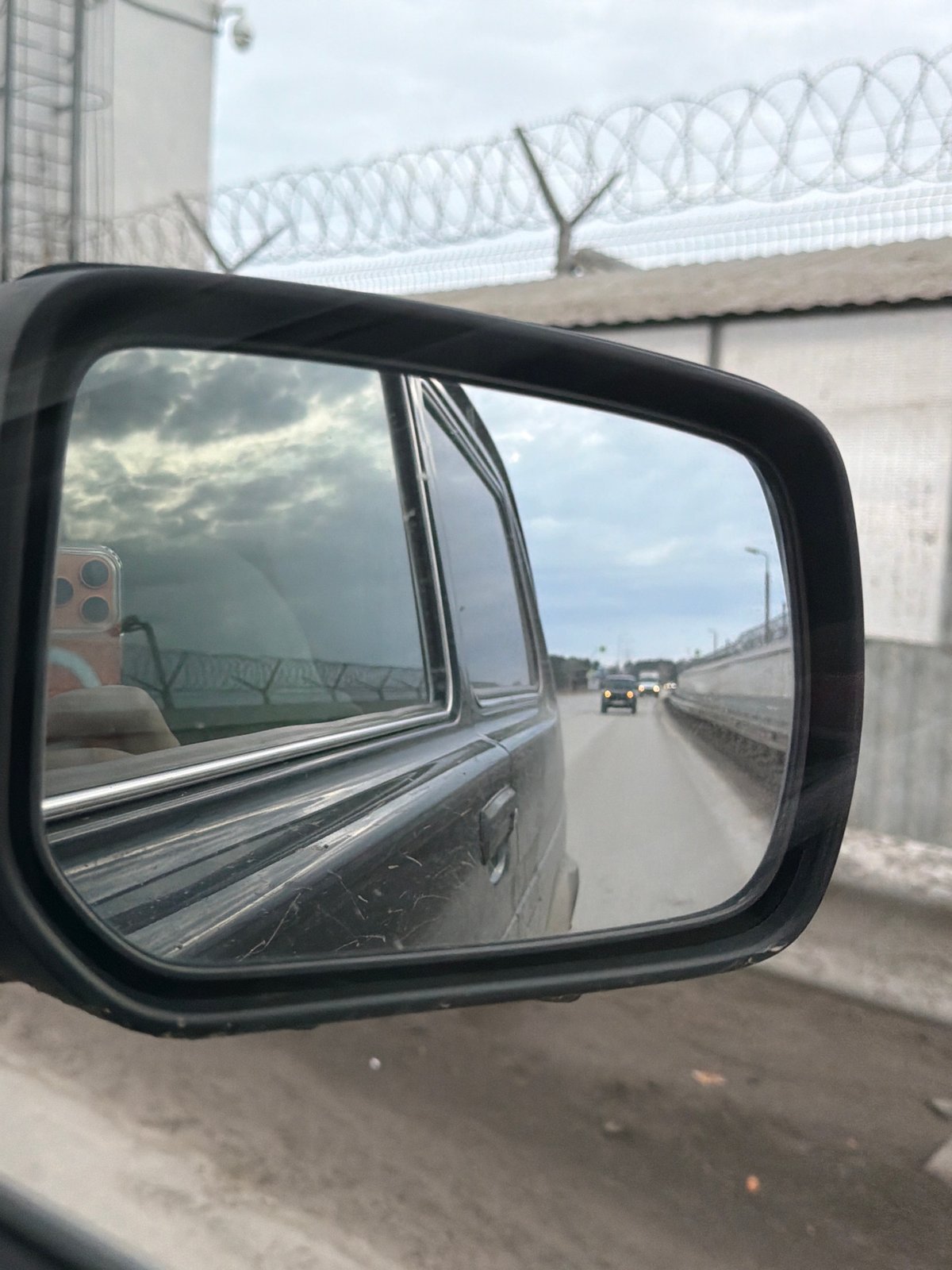 Early morning highway travel documented near Chaykovsky, Russia