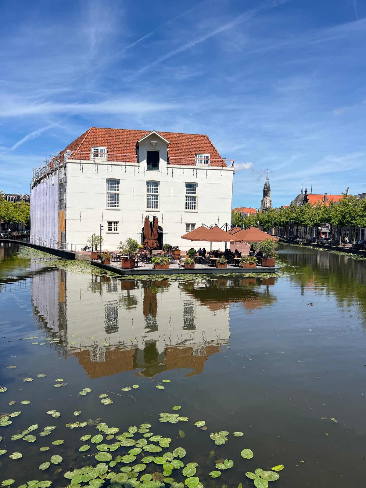 Sunny afternoon on the canals of Delft