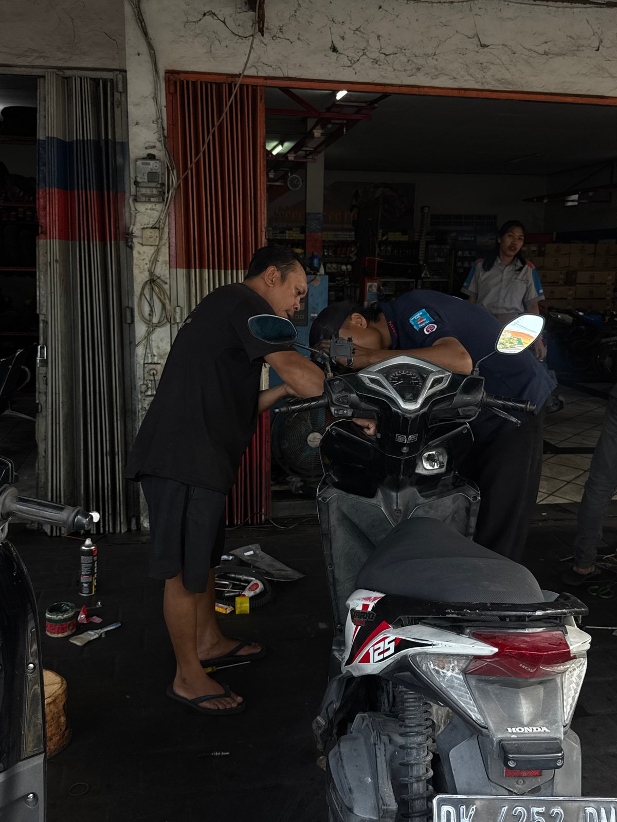 Motorcycle repair work underway in North Kuta shop