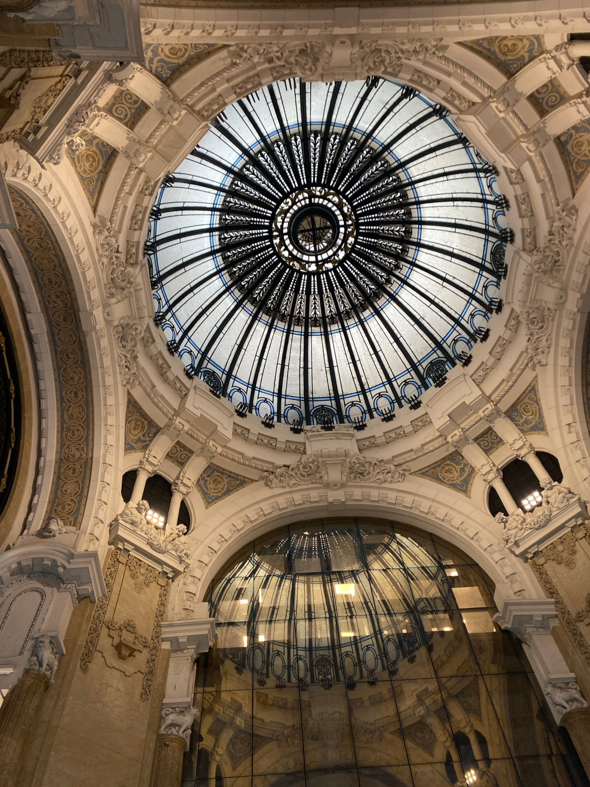 Tourist documents Buenos Aires architectural landmarks during downtown walking tour