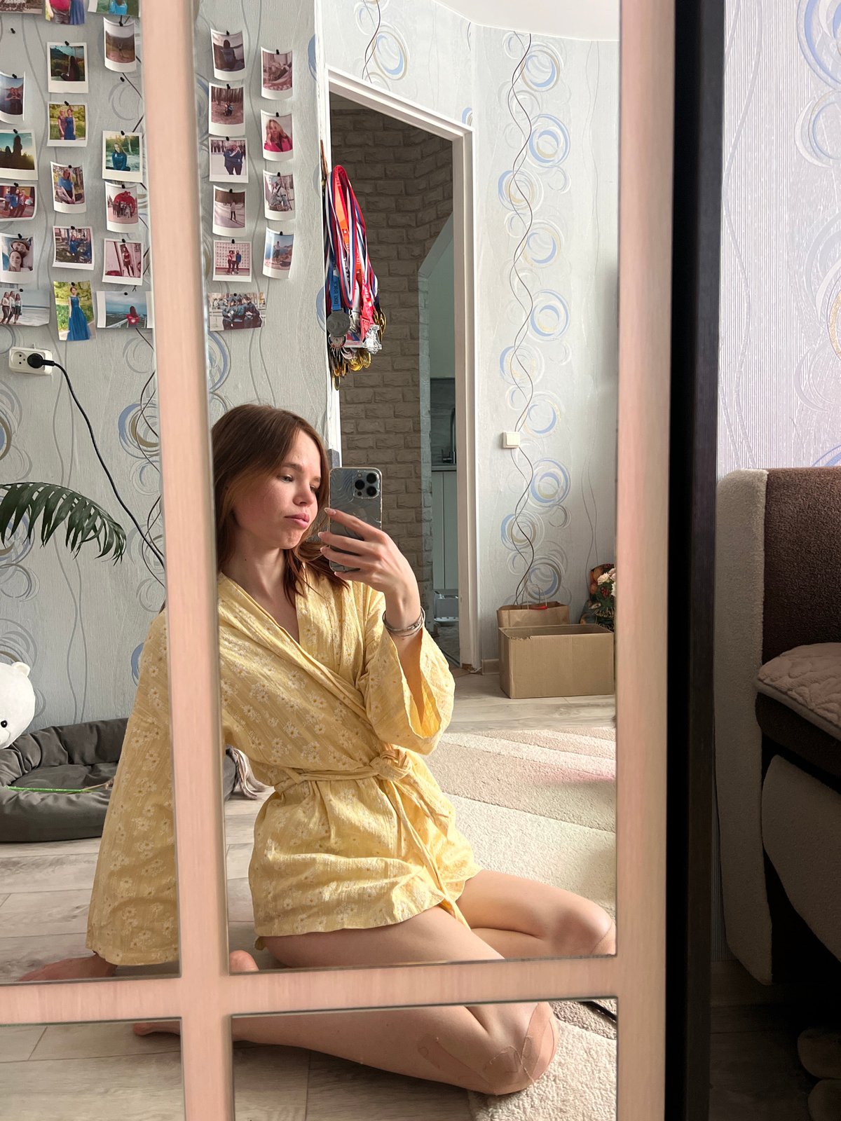 Woman shares quiet morning with tabby cat in Chaikovsky