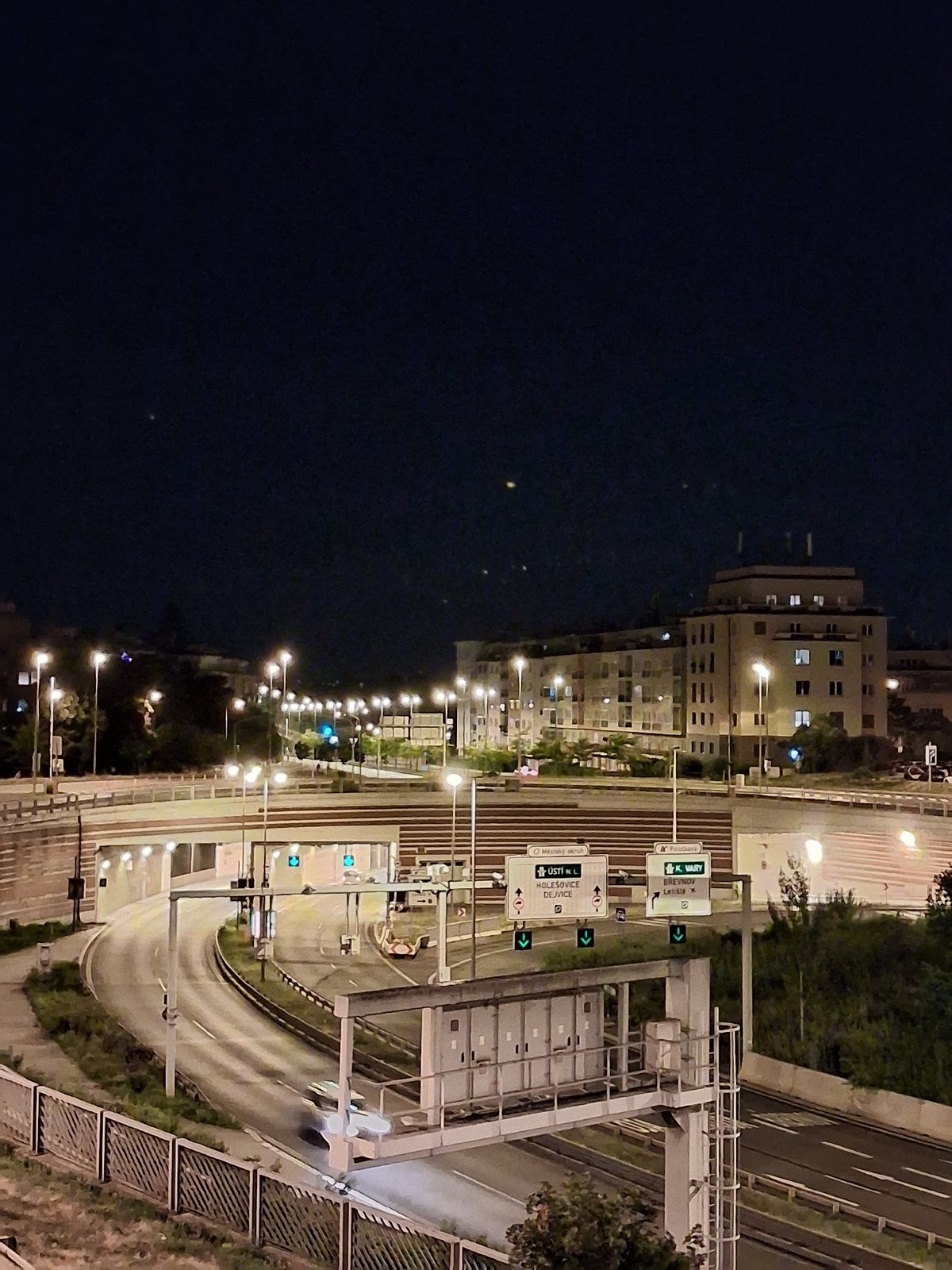 Night stop at a Prague highway interchange, July 2026