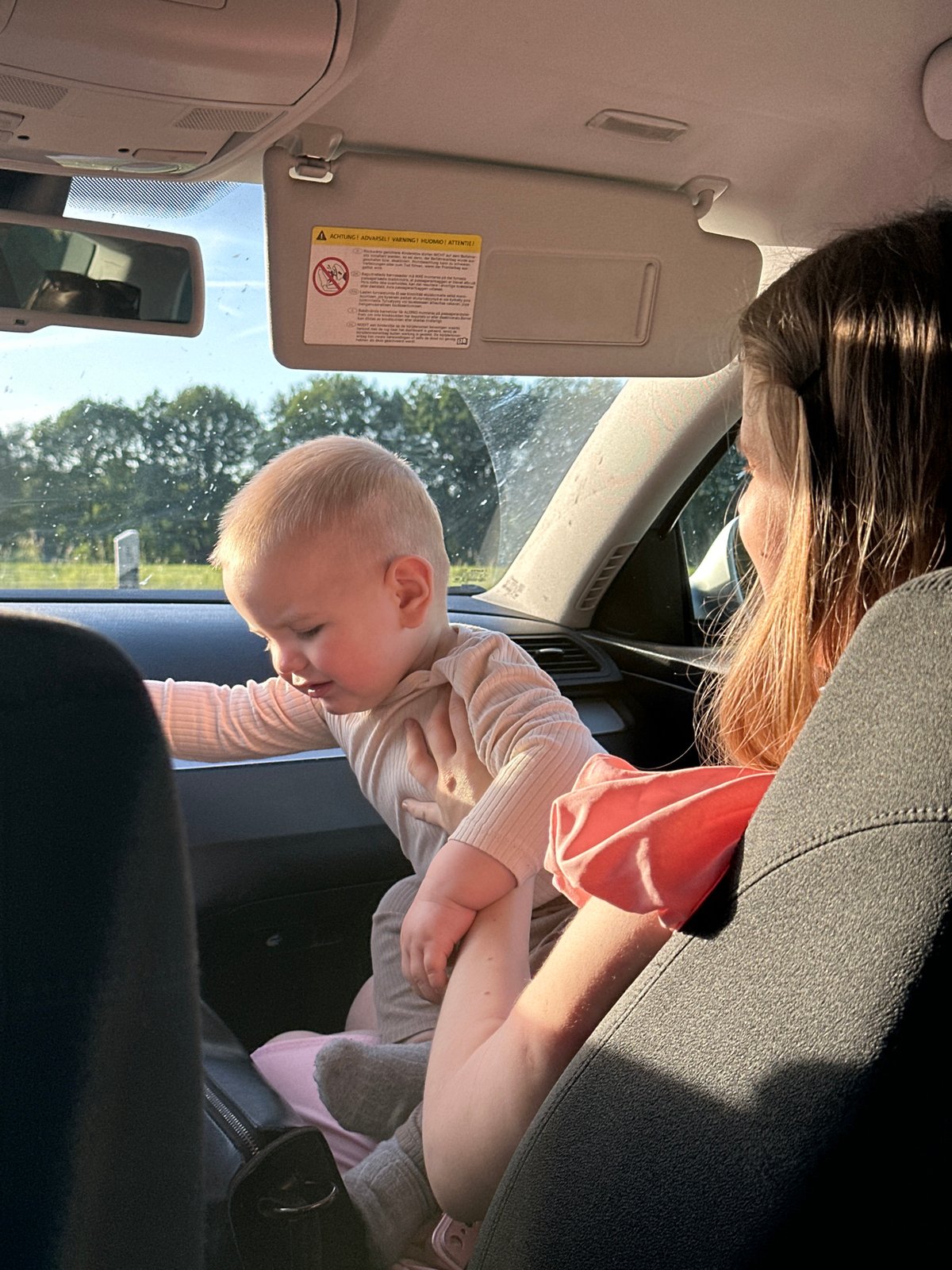 Woman and baby photographed during car journey in Hamburg