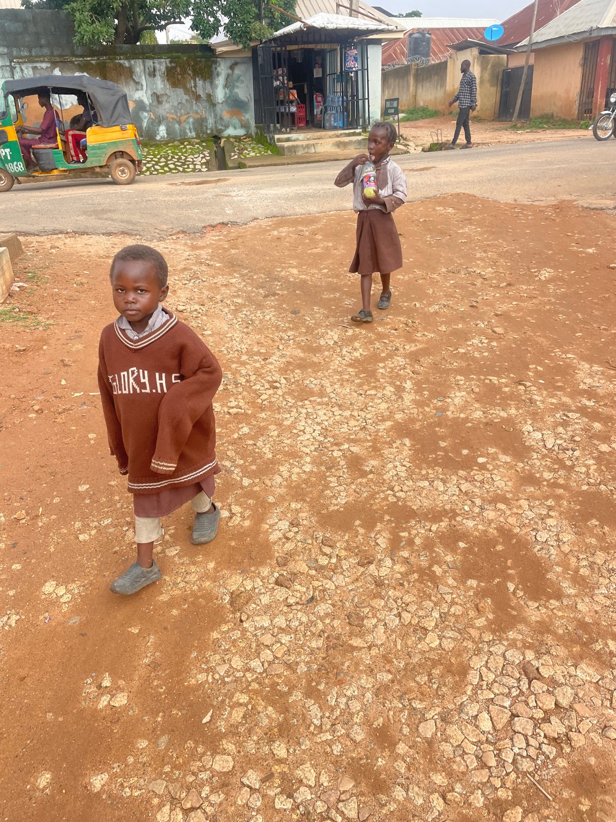 Morning scenes around Barakin Akawo: school runs and a local gym