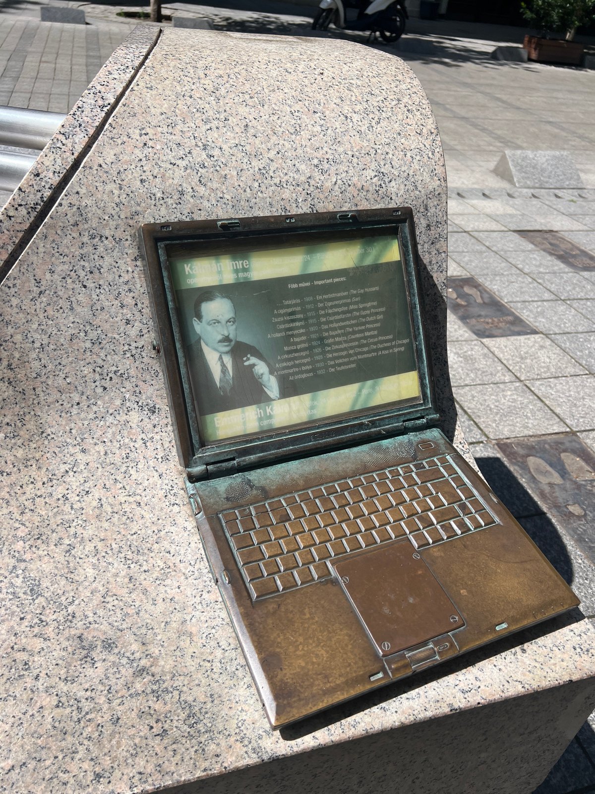 Bronze laptop memorial sculpture spotted on Budapest street